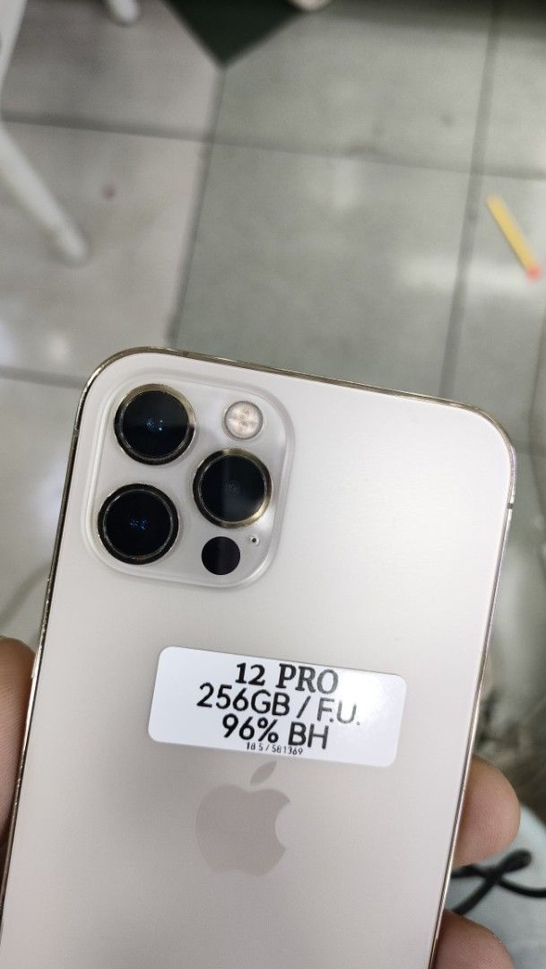 IPHONE 12 PRO 256GB OPENLINE 96%BH (Category: iPhone 12 Series) located in Manila. Submitted by westclutchtradinggadgetinco. (Listing ID 1418376793, Image 2). Description: SALE OR SWAP ! MABILIS KAUSAP ! LEGIT SELLER ! W/ WARRANTY 💯💯💯 •IPHONE 12 PRO •256 GB (Other storage is also available) •Gold (Other color is also available) •Factory Unlock / Openline •96% Battery Health •Face ID Working •Truetone Working •No Hidden Issues | Unli reset •No 