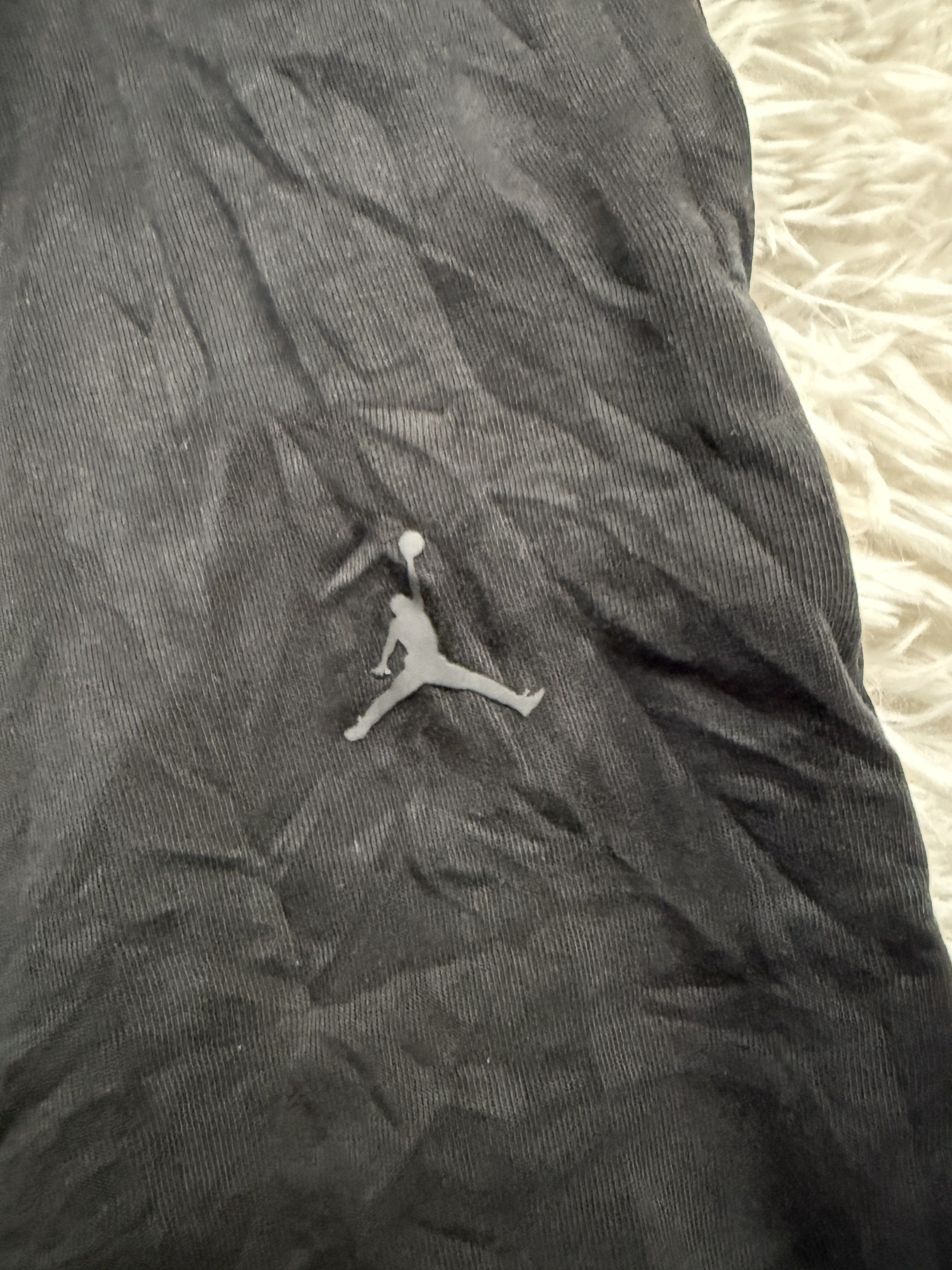 Jordan Dri-FIT Black Pants - Size M (Category: Joggers) located in Manila. Submitted by keepercollection (Listing ID 1418209744, Image 3). Description: - Black Jordan Dri-FIT pants - Size: M - Features: Jumpman logo, NBA patch, drawstring waistband, zippered ankles - Relaxed fit - Comfortable material - Made in China - Perfect for casual wear and workouts.