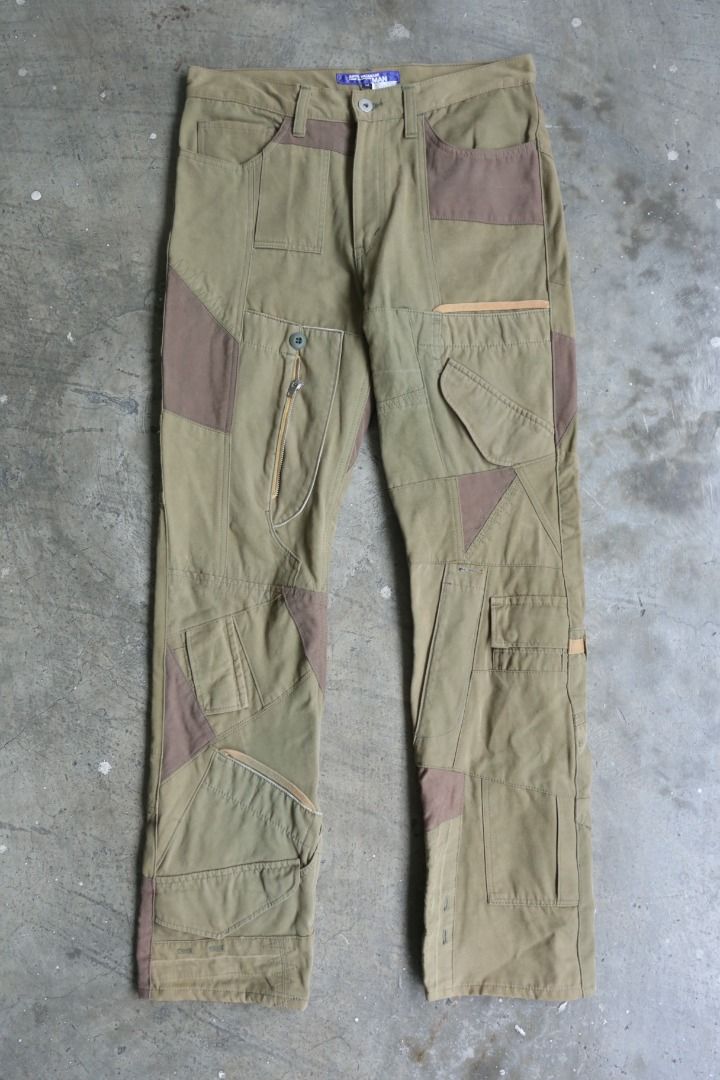 Junya Watanabe - F/W 06 - Deconstructed Cargo Pants (Category: Trousers) located in Manila. Submitted by graymatter_ (Listing ID 1418310034, Image 3). Description: Junya Watanabe - F/W 06 - Deconstructed Cargo Pants Tagged Size: M Condition: 8.5/10 Flaws: Overall Minor Stains Material: 100% Cotton Zipper: YKK Made in: Japan Dimensions Waist: 33 Inseam: 31 Crotch: 13.5 Thigh: 11.5 Leg Opening: 7.5 .