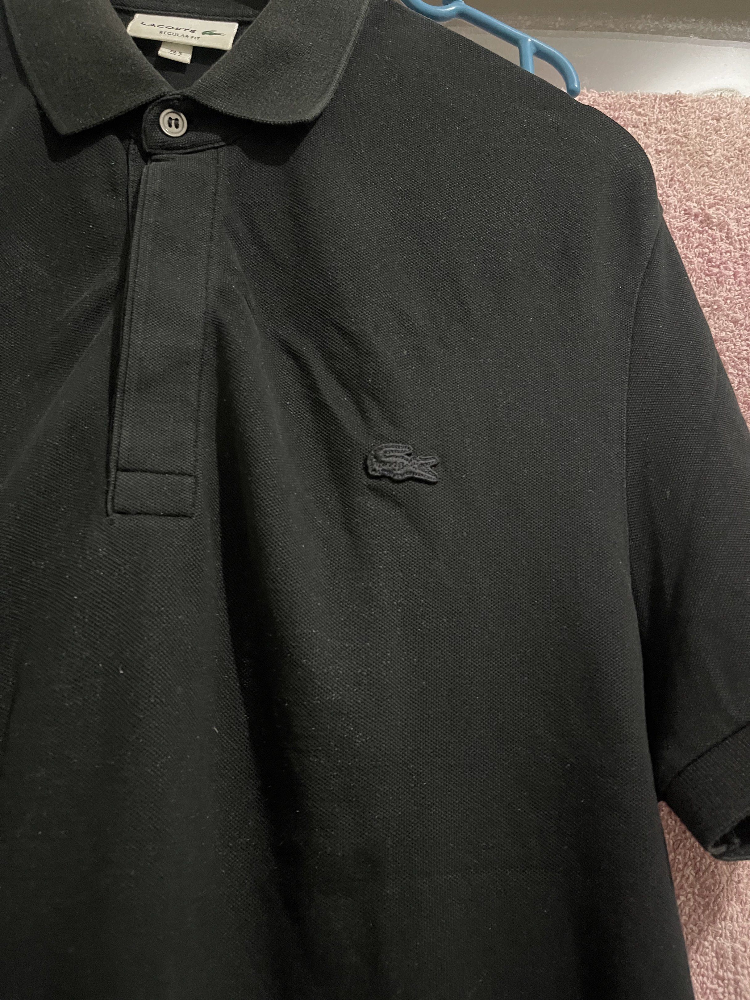Lacoste Monotone Polo Shirt Large (Category: Tshirts & Polo Shirts ) located in Batangas. Submitted by jomajomastuff (Listing ID 1418315904, Image 2). Description: FOR SALE ‼️‼️‼️ Lacoste Polo shirt Monotone (Black) Size large on tag, regular fit 100% authentic 28 length, 21 width Excellent condition Color rate 9.5/10 Color may vary due to camera and lighting No issue: need wash lang kasi na stock pero overall black na black ₱1400 Lima Batangas L
