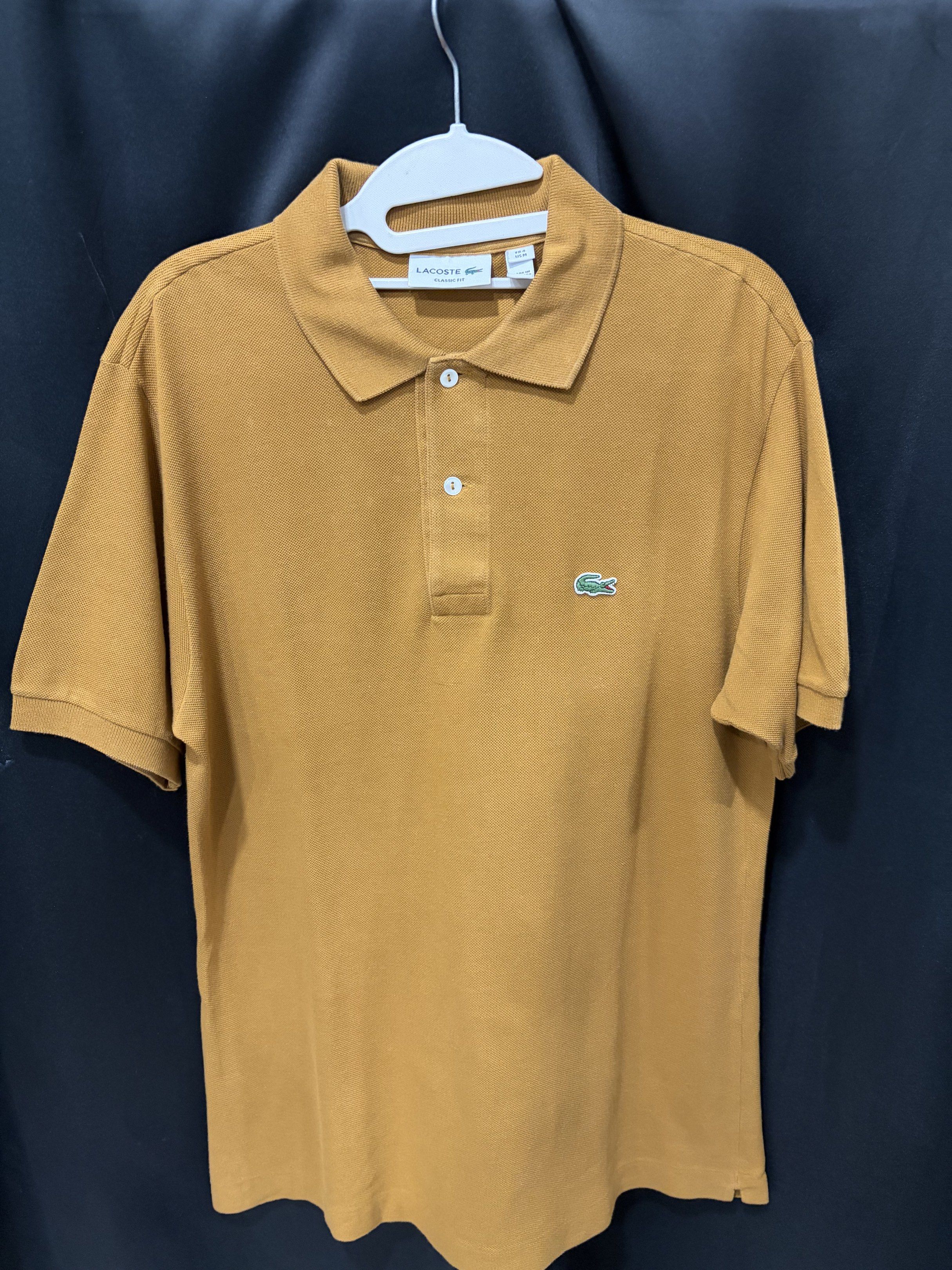 Lacoste Polo Shirt (Category: Tshirts & Polo Shirts ) located in Quezon City. Submitted by masterjami (Listing ID 1418273657, Image 3). Description: Original Lacoste Polo shirt.