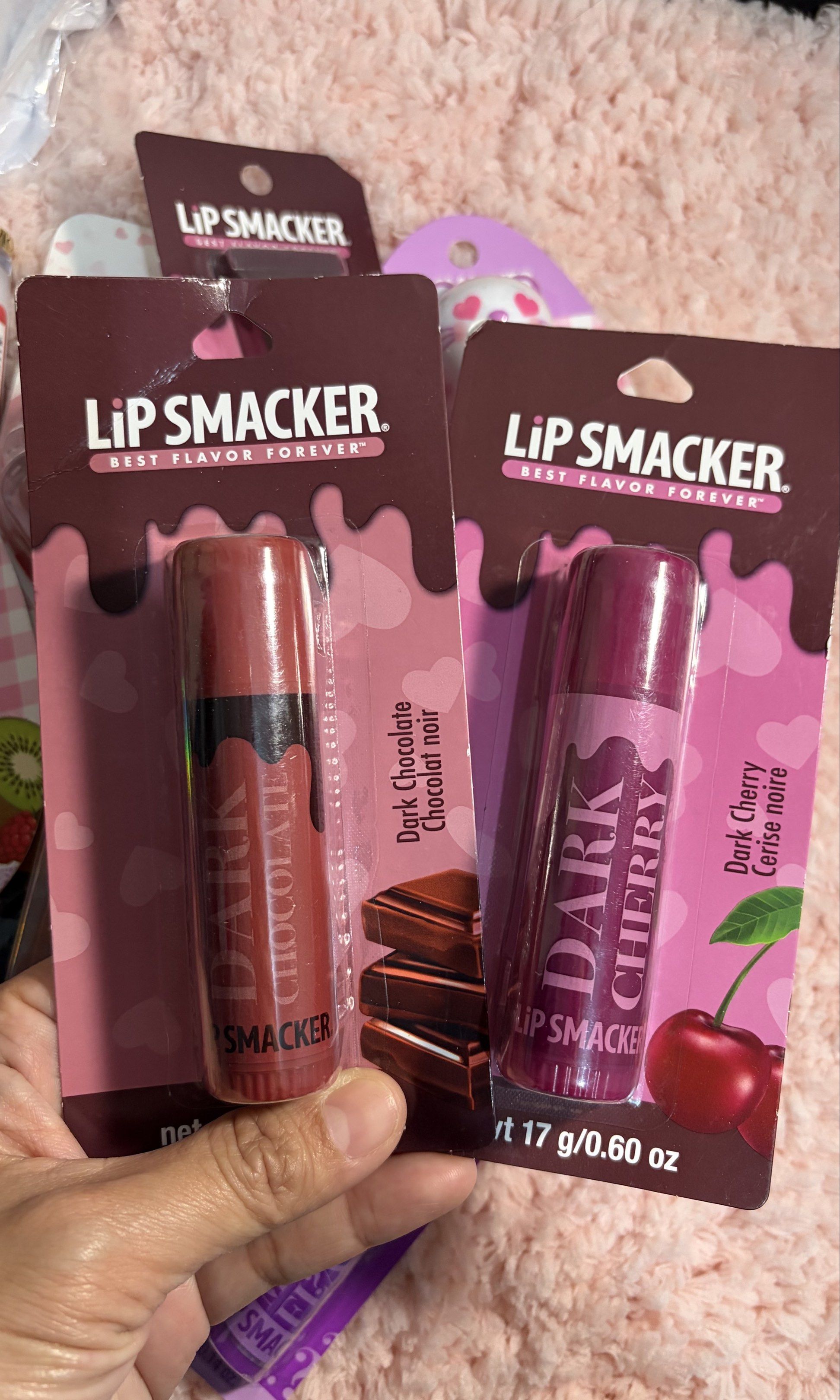 Lip Smacker Dark Chocolate & Dark Cherry Lip Balm (Category: Makeup) located in Manila. Submitted by Miss_KSJ (Listing ID 1418325966, Image 1). Description: - Lip Smacker lip balms - Flavors: Dark Chocolate and Dark Cherry - Size: 17g / 0.60 oz each - Packaging: Original, sealed - Dark Chocolate: Brown tube - Dark Cherry: Purple tube.