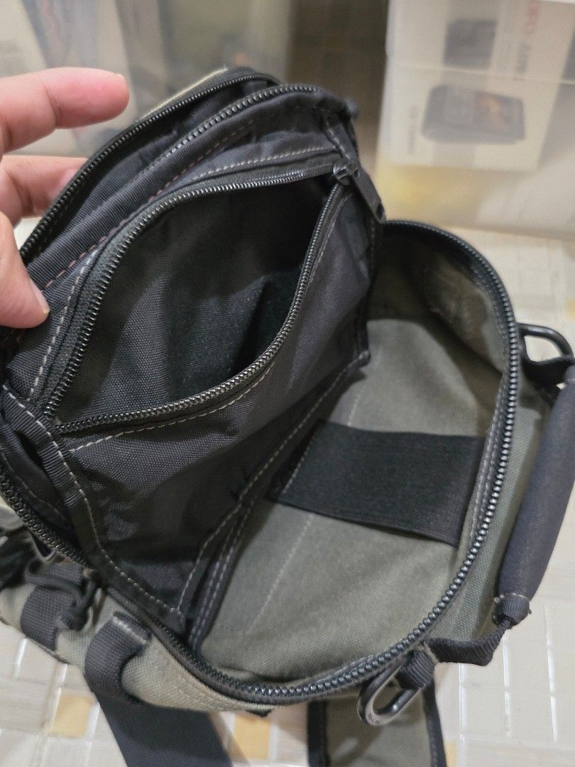 Maxpedition American Design Sling Bag (Category: Sling Bags) located in Dasmarinas. Submitted by ildnumde (Listing ID 1411827183, Image 3). Description: - Maxpedition Lunada sling bag - wolf grey colorway - Features a mesh back panel for breathability - Adjustable straps for a comfortable fit - Multiple compartments for organization - Includes attachment points for accessories - Durable construction - American design, made in Taiwan - Suitable fo