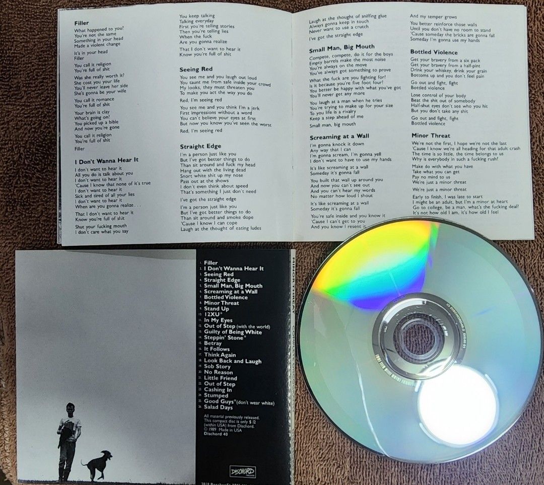 Minor Threat - Complete Discography (Category: CDs & DVDs) located in Cebu City. Submitted by g_roshamboo (Listing ID 1418376867, Image 3). Description: CD features Minor Threat's complete discography. It includes the album "Out of Step" and a booklet with lyrics. The CD is in its original case. The tracklist includes songs like "Filler", "I Don't Wanna Hear It", "Seeing Red", and "Bottled Violence"..