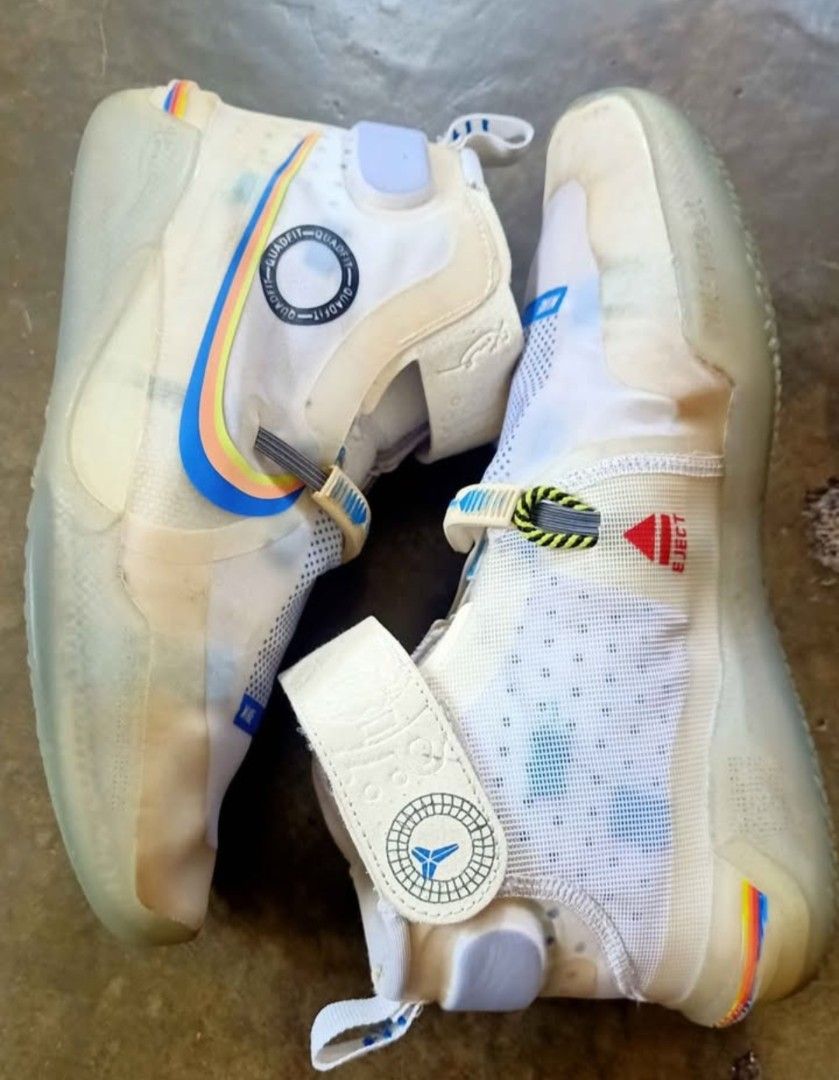 Nike Kobe AD NXT FF (Category: Sneakers) located in Bacoor. Submitted by icemanice02 (Listing ID 1418287686, Image 2). Description: - Nike Kobe AD NXT FF sneakers - White and translucent design - Multi-colored swoosh - High-top design - Features strap with Kobe logo - Includes pull tabs - Unique sole pattern - Comes with original box.