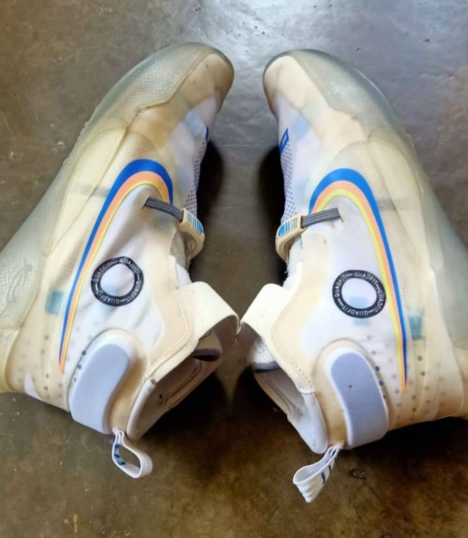 Nike Kobe AD NXT FF (Category: Sneakers) located in Bacoor. Submitted by icemanice02 (Listing ID 1418287686, Image 3). Description: - Nike Kobe AD NXT FF sneakers - White and translucent design - Multi-colored swoosh - High-top design - Features strap with Kobe logo - Includes pull tabs - Unique sole pattern - Comes with original box.