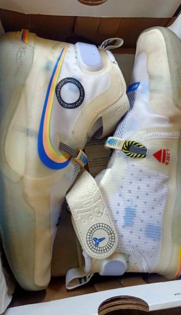 Nike Kobe AD NXT FF (Category: Sneakers) located in Bacoor. Submitted by icemanice02 (Listing ID 1418287686, Image 1). Description: - Nike Kobe AD NXT FF sneakers - White and translucent design - Multi-colored swoosh - High-top design - Features strap with Kobe logo - Includes pull tabs - Unique sole pattern - Comes with original box.