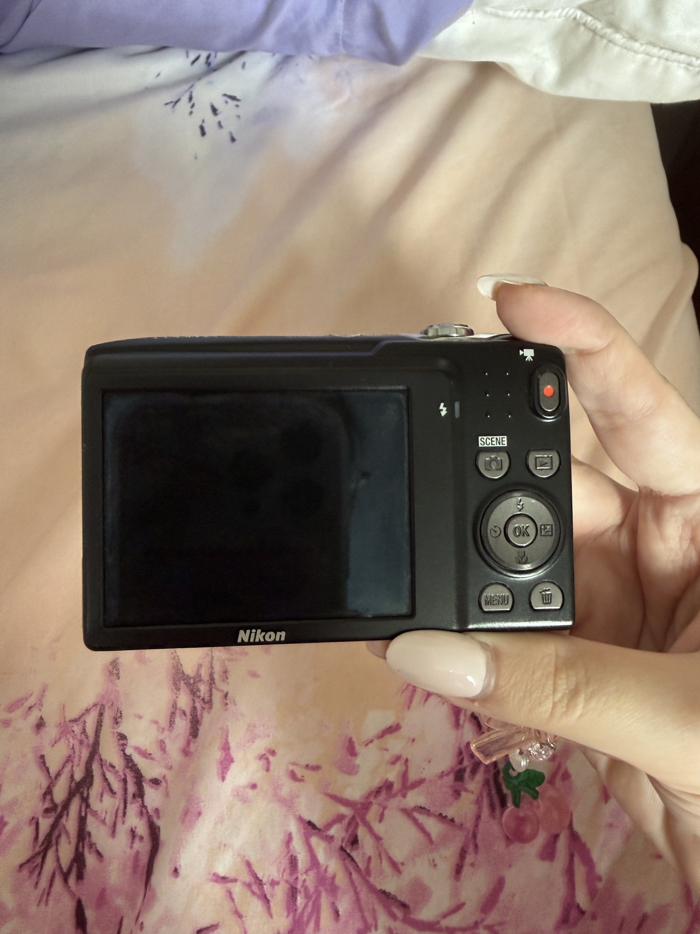 Nikon COOLPIX S3100 (Category: Cameras) located in Las Pinas. Submitted by fhrjs (Listing ID 1418221853, Image 2). Description: - Red Nikon COOLPIX S3100 digital camera - Features a Nikkor lens with optical zoom - Includes a screen and buttons on the back - Decorated with stickers - In good working condition MESSAGE ME FOR SAMPLE PICTURES NEGOTIABLE!.