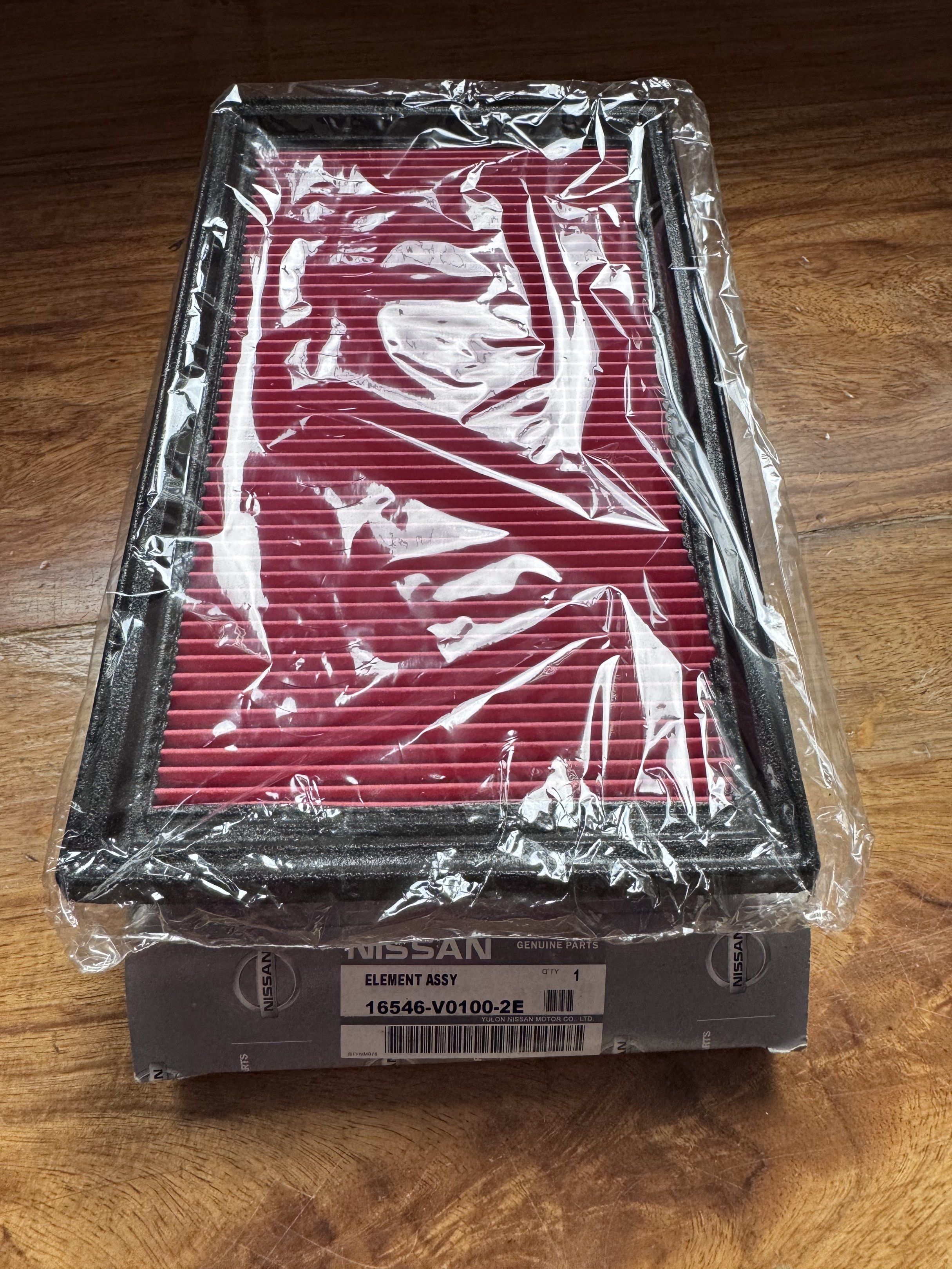 Nissan Airfilter Element Assy 16546-V0100-2E (Category: Engine and Aircon Parts and Accessories) located in Quezon City. Submitted by katharus (Listing ID 1418287097, Image 1). Description: Genuine Parts Nissan Airfilter 16546-V0100 sealed Purpose: Ensures clean air intake, maximizing engine performance, and preventing dust penetration. Common Applications: Nissan Sentra (1991-2006), Maxima (1995-2017), Pathfinder (1996-2004), 350Z (2003-2007), F