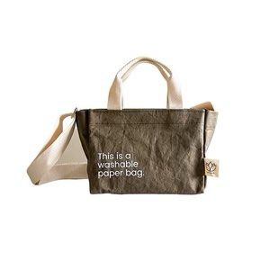 Olive New Earth Washable Paper Bag (Category: Tote Bags) located in Makati City. Submitted by thingsoncelovedph (Listing ID 1418350738, Image 1). Description: See photos for description Originally ₱495 Now ₱220.