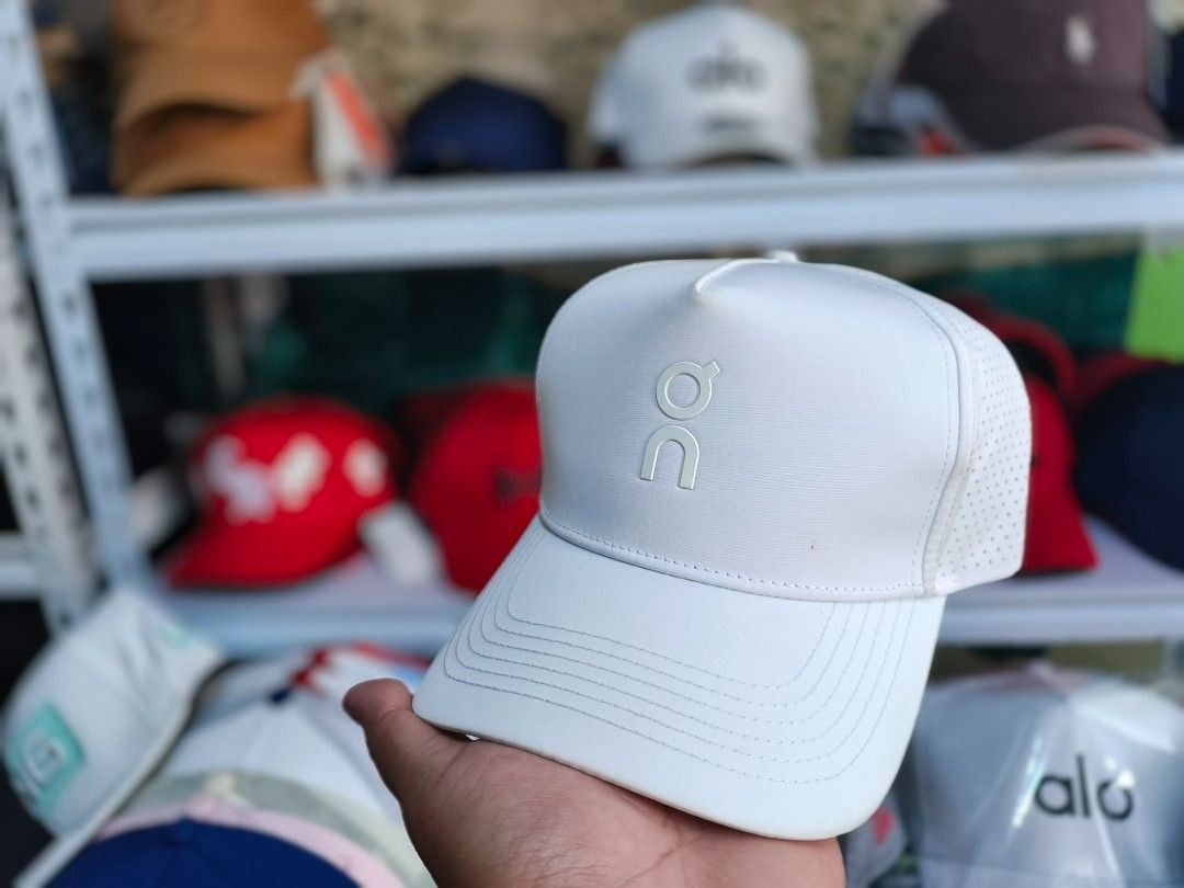 On Cloud Active/running Cap (Category: Caps & Hats) located in Manila. Submitted by aesparcia23 (Listing ID 1415245678, Image 2). Description: - Black On Cloud cap - Premium quality - Perforated sides for breathability.