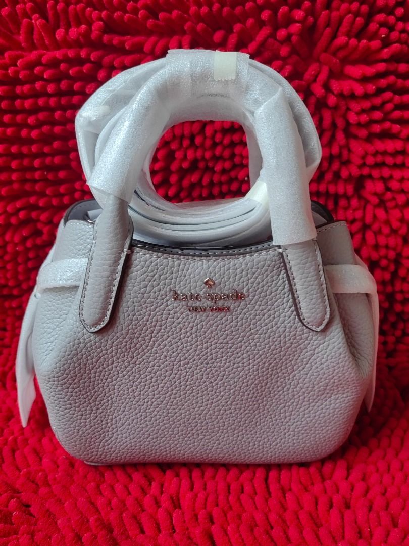 Original KS Mini Dumpling Satchel with Strap (Category: Luxury Bags & Wallets) located in Puerto Galera. Submitted by charisarifinds (Listing ID 1418319599, Image 1). Description: Brand new Original Kate Spade Mini Dumpling Satchel with Strap Material: Pebbled Leather 18cm L x 15cm H x 10cm W ✅ Fits phone and small wallet Inclusion: Original packaging and tag 💯 Original from Canada, money back guaranteed if proven fake Disclamer: Chari Sari Find
