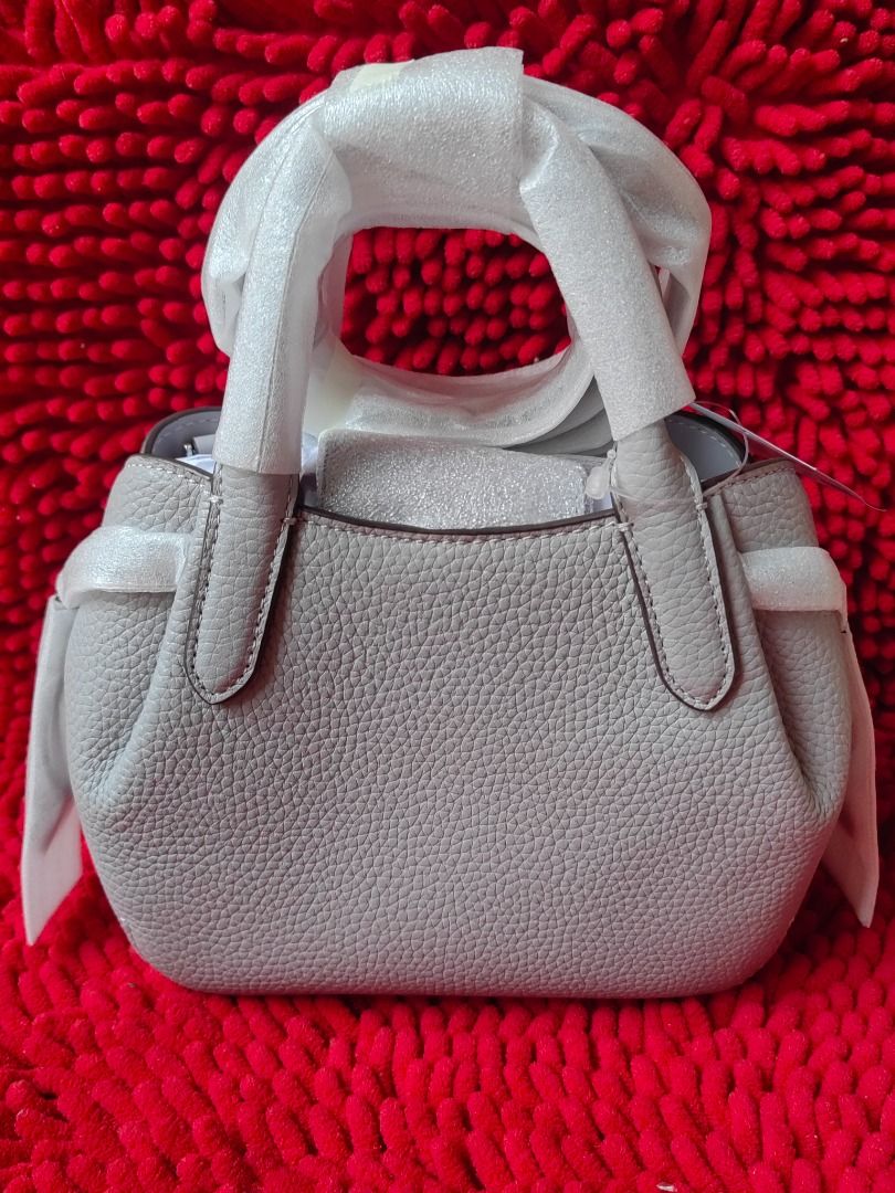 Original KS Mini Dumpling Satchel with Strap (Category: Luxury Bags & Wallets) located in Puerto Galera. Submitted by charisarifinds (Listing ID 1418319599, Image 2). Description: Brand new Original Kate Spade Mini Dumpling Satchel with Strap Material: Pebbled Leather 18cm L x 15cm H x 10cm W ✅ Fits phone and small wallet Inclusion: Original packaging and tag 💯 Original from Canada, money back guaranteed if proven fake Disclamer: Chari Sari Find