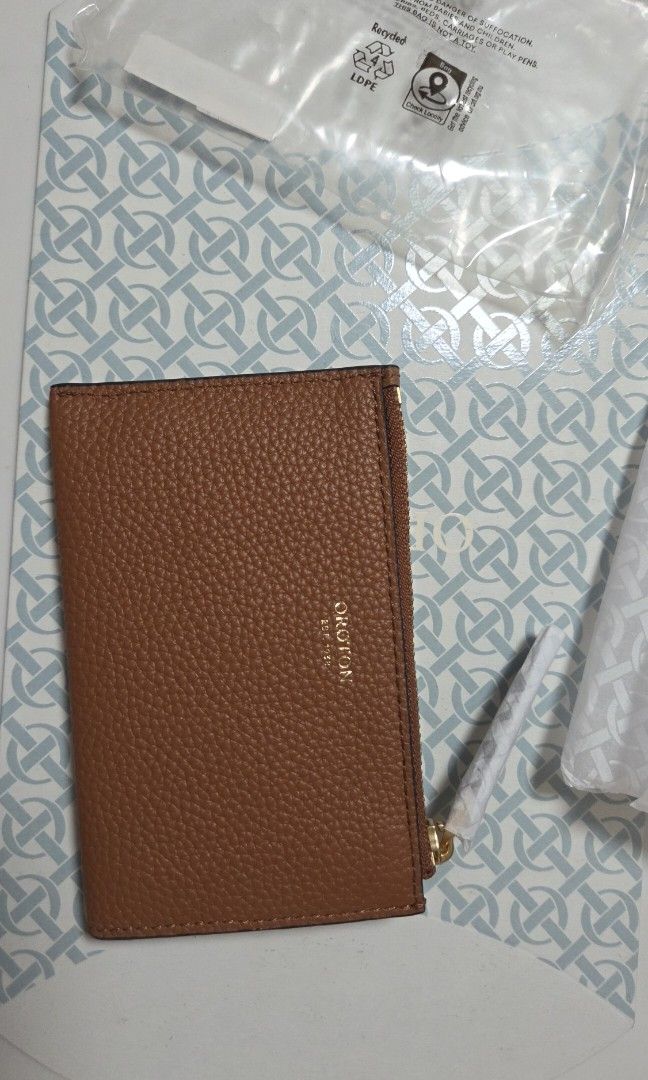 Oroton card case (Category: Luxury Bags & Wallets) located in Quezon City. Submitted by myprelovedfindsph (Listing ID 1418240214, Image 1). Description: Brandnew Oroton card case / coin purse. Complete inclusion plus gift box..