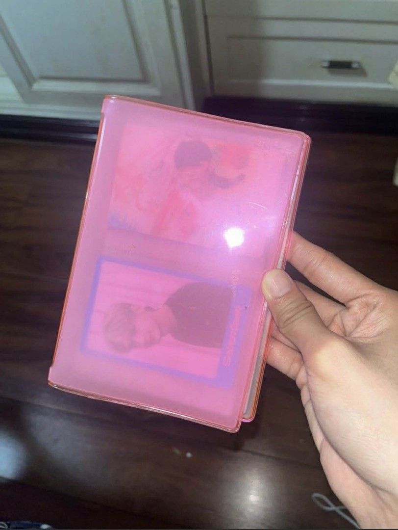 Pink Photo Card Binder (Category: Stationery & School Supplies) located in Pasig City. Submitted by hazelscollectibles (Listing ID 1418392544, Image 1). Description: - Pink photo card binder - Multiple slots for photo cards maybe around 30+ - Clear cover Photocard for sample only not included - Ideal for storage and display.