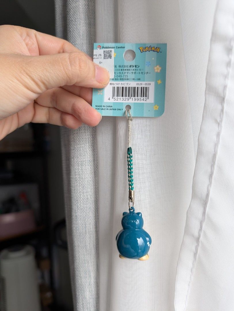 Pokemon Snorlax Keychain (Category: Character Goods) located in Quezon City. Submitted by charmerchant (Listing ID 1418288531, Image 3). Description: - Adorable Snorlax keychain! -with bell and sound - Features a detailed Snorlax figure. - Color scheme: Teal and beige. - Includes original tag. - Great accessory for keys, bags, or backpacks. - Perfect for Pokemon fans!.