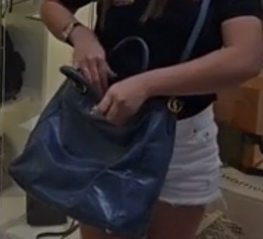 Prada Leather Tote Bag (Category: Luxury Bags & Wallets) located in Paranaque City. Submitted by sctmpque (Listing ID 1418394172, Image 3). Description: - Navy blue Prada tote bag - Gold-tone hardware - Includes detachable luggage tag - Interior zippered pocket - Double handles and shoulder strap - Prada logo on front SF c/o Buyer.
