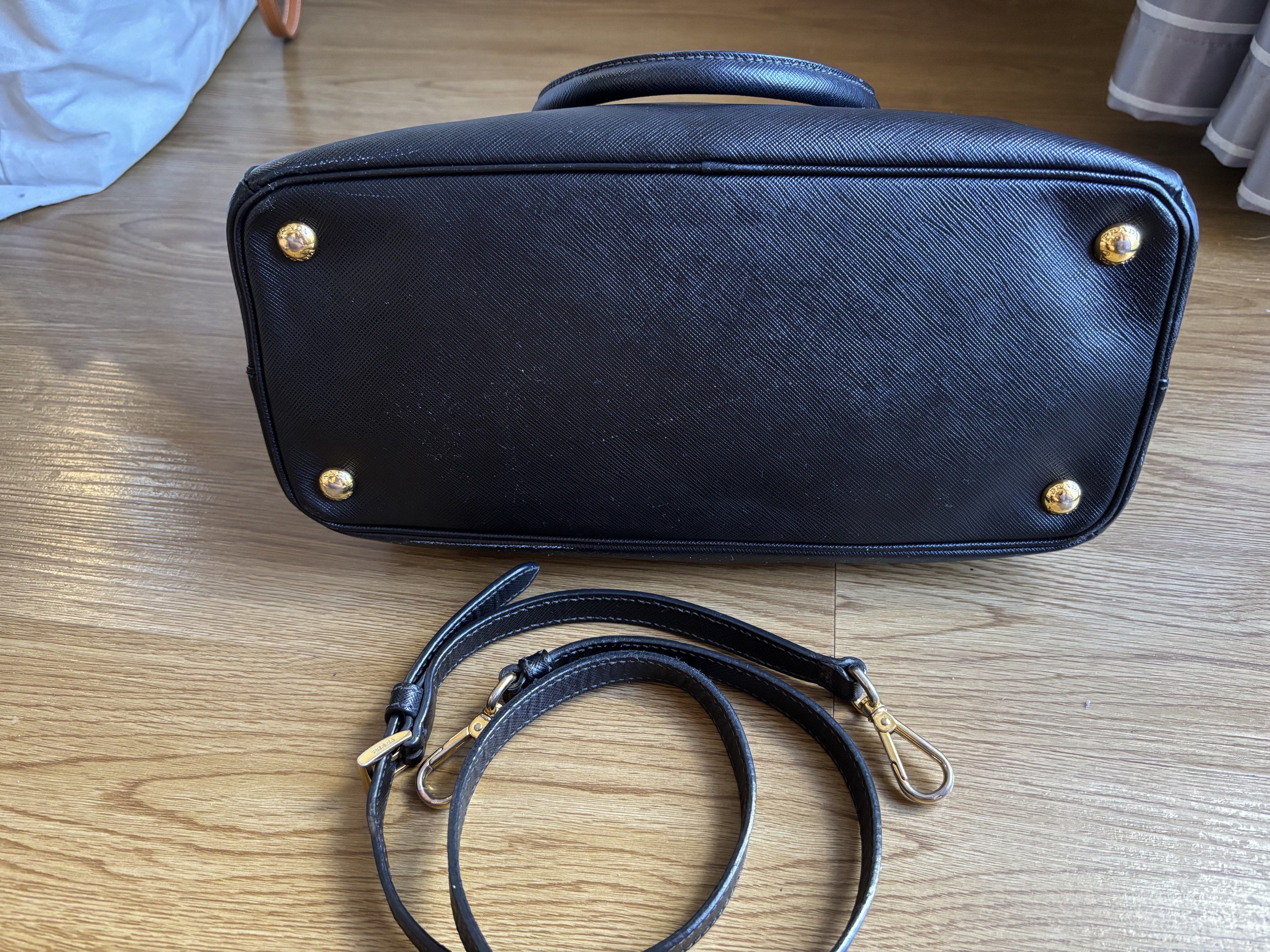 Prada Saffiano Galleria Small (Category: Luxury Bags & Wallets) located in Las Pinas. Submitted by itskat.cruz (Listing ID 1418391257, Image 2). Description: Authentic Prada Galleria in small size In very good condition (flaws: small cracks in the edging; cracked snap button but works fine) No inclusions.