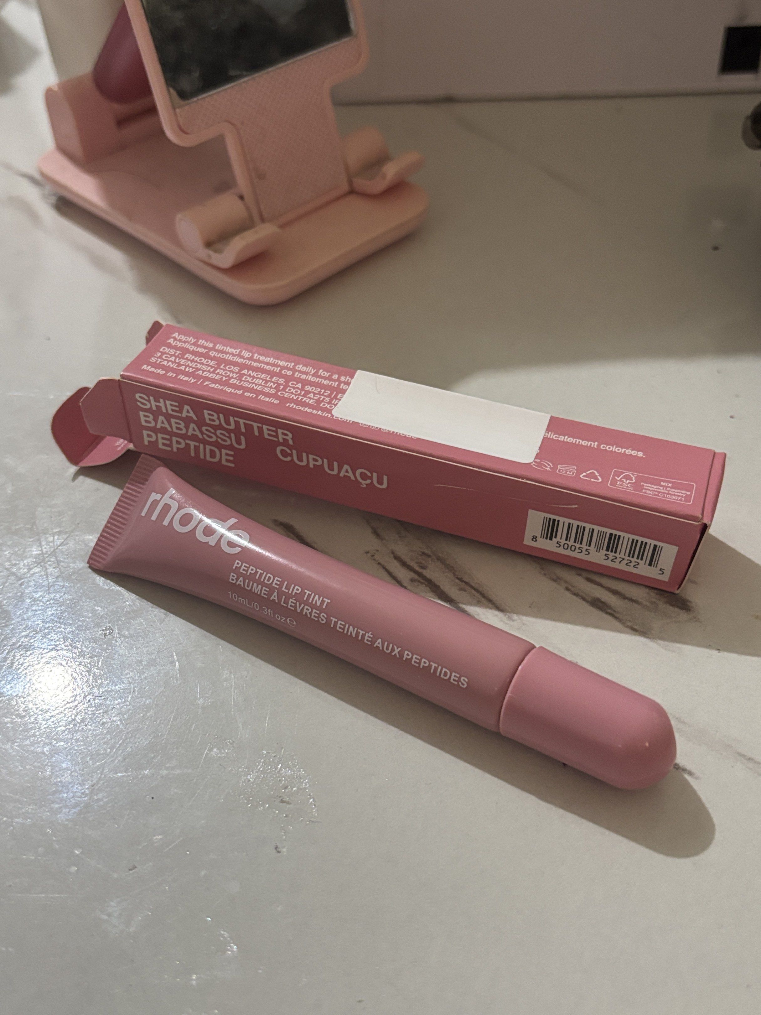 RHODE Peptide Liptint in Ribbon (Category: Makeup) located in Mandaluyong City. Submitted by shopwithchai.ph (Listing ID 1418392539, Image 1). Description: - only used as an accessory for the phone case - used once or twice for swatching - shade did not suit me🥲 - no box, idk where it is - not using anymore, just clutter.