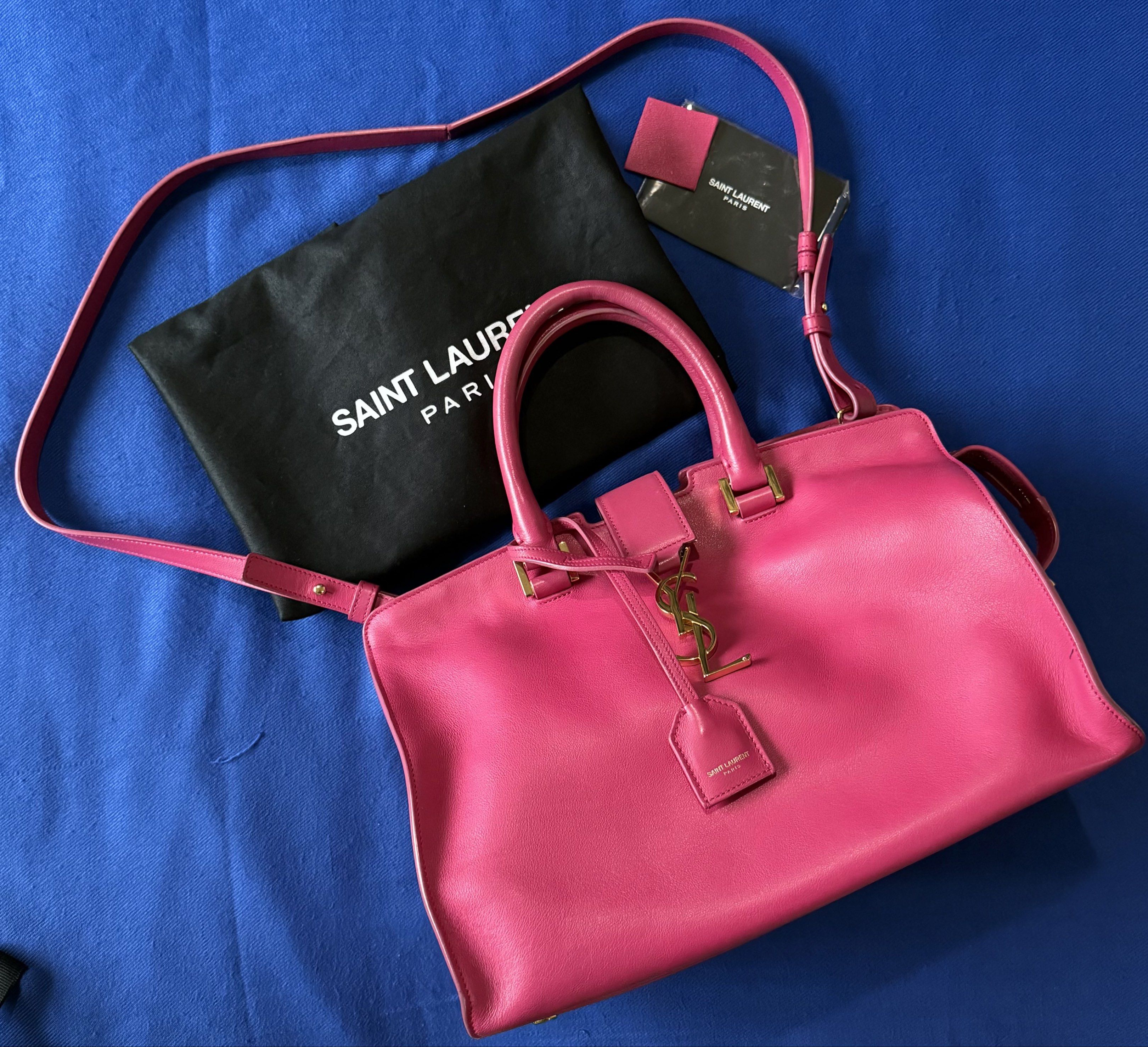 Saint Laurent Cabas Bag (Category: Luxury Bags & Wallets) located in Marikina City. Submitted by all4bangtan (Listing ID 1418300860, Image 1). Description: - Authentic Saint Laurent handbag - Vibrant pink color - Includes dust bag and tags - Gold-tone logo and hardware.