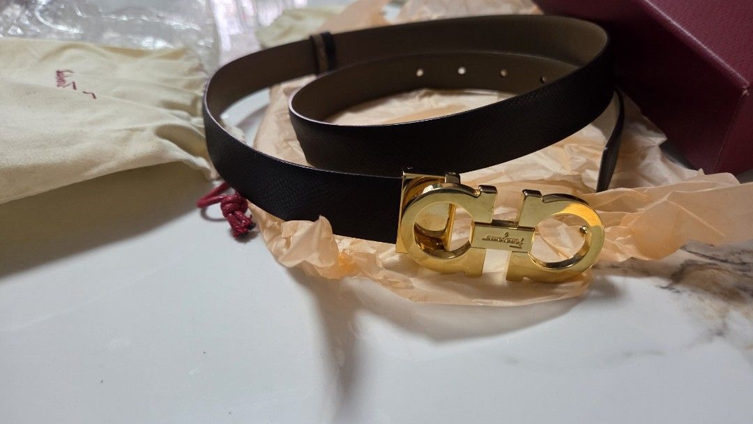 Salvatore Ferragamo Reversible belt (Category: Luxury Accessories) located in Quezon City. Submitted by myprelovedfindsph (Listing ID 1418241245, Image 1). Description: Almost new SF reversible belt - Black/Taupe color. Used twice only. 102cm/40in Complete inclusions.. dustbags plus box and paper bag..