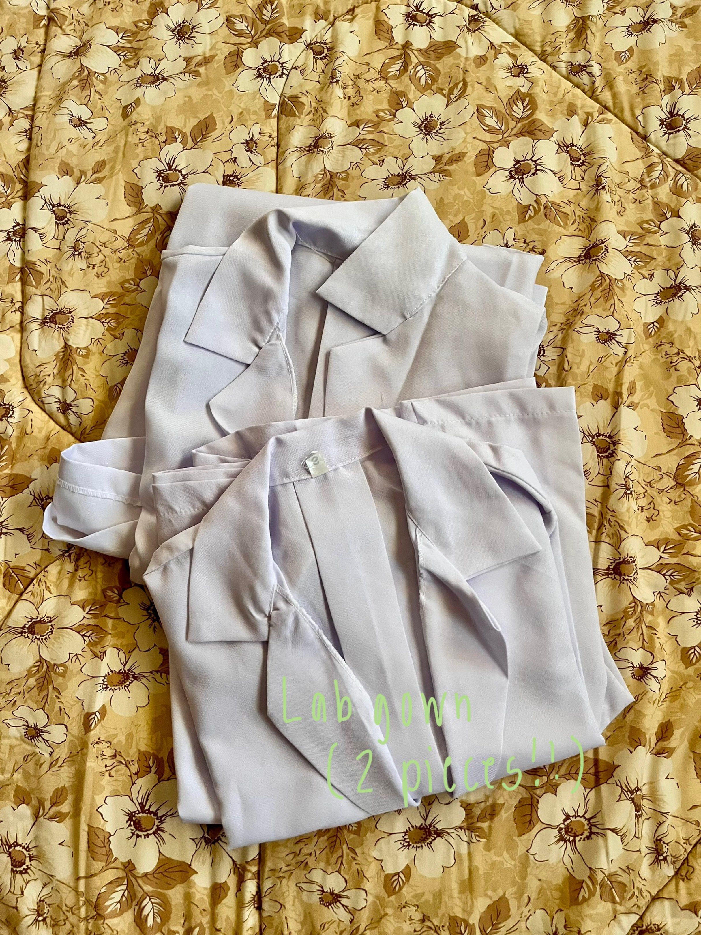 Tailored - White Lab Gowns (2 pieces) (Category: Medical Supplies & Tools) located in Baguio. Submitted by 2figs.sycam0re (Listing ID 1418269854, Image 1). Description: - White lab gowns available. - Options: - Tailored lab gown (Small size) with two pockets and buttons. - Two-piece lab gown..