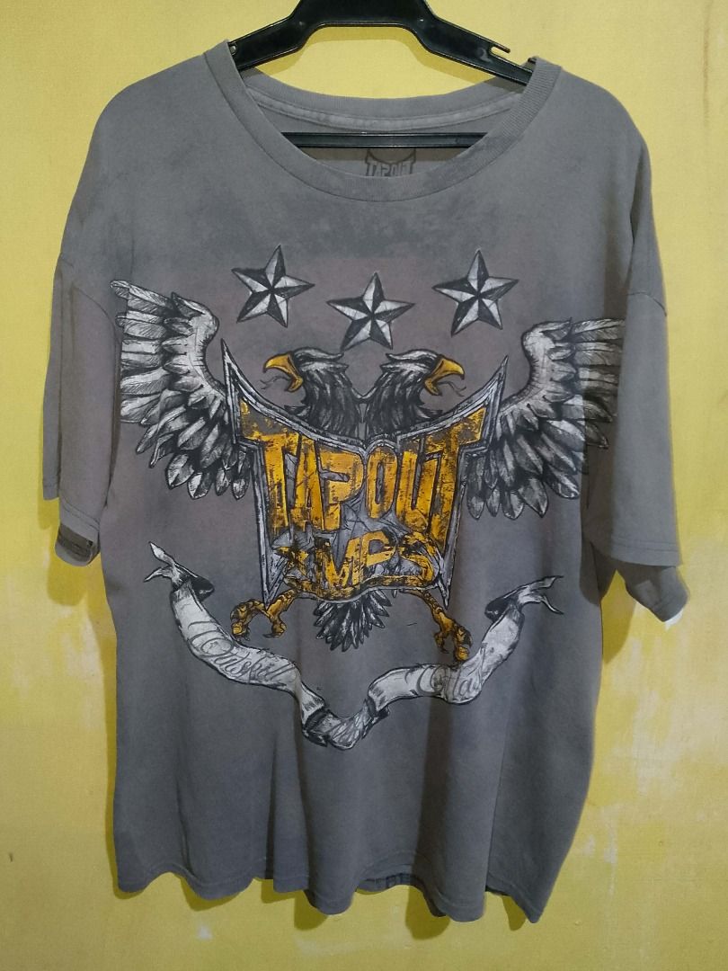 TAPOUT MPS GRAPHIC T-SHIRT (Category: Tshirts & Polo Shirts ) located in Quezon City. Submitted by slimepapi88 (Listing ID 1418306287, Image 1). Description: fs tapout mps t-shirt 22 x 28 nasa picture na lahat ng issues fading,crack prints, rust goods pang vintage vibe 200 + shipping!.