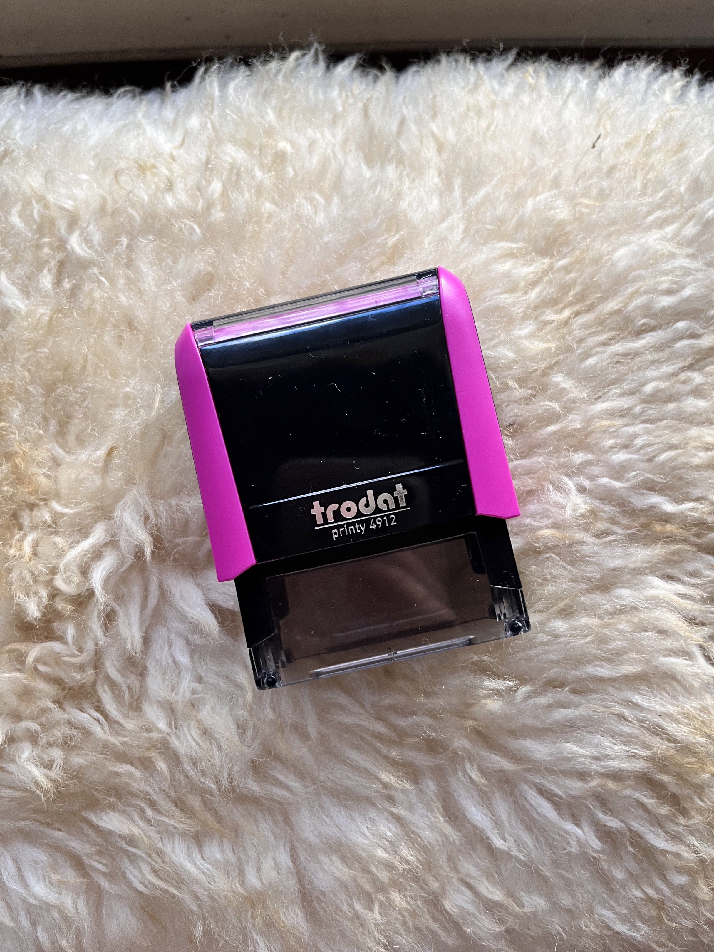Preloved Trodat 4912 - Magenta (Category: Craft Supplies & Tools) located in Baguio. Submitted by 2figs.sycam0re (Listing ID 1418252872, Image 1). Description: - Trodat Printy 4912 stamp - Color: Magenta and Black - Condition: Only used once - Rubber stamp NOT included RFS: Too big for my liking.