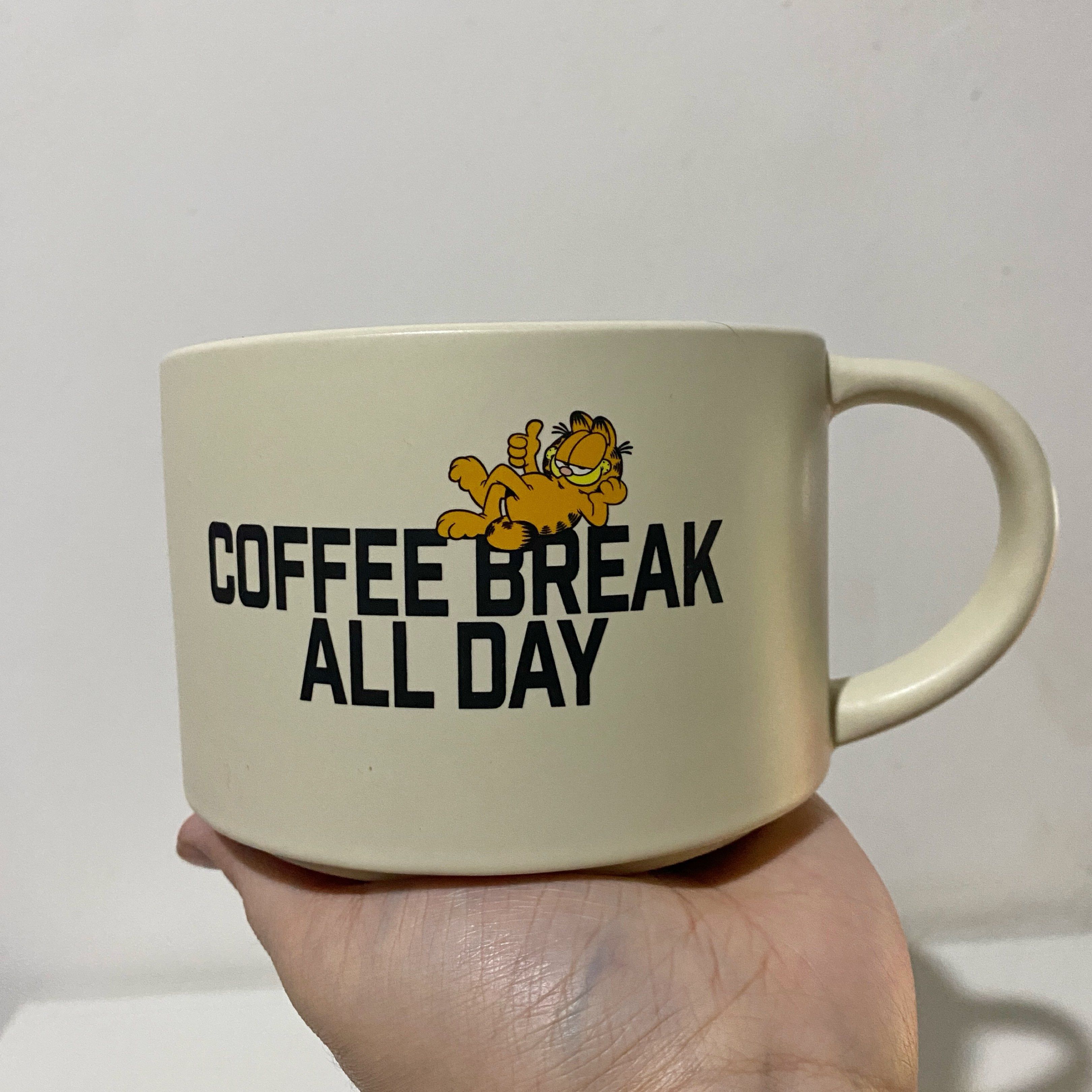 TYPO x Garfield Collab Big Mug (Category: Coffee & Tea Tableware) located in Bulacan. Submitted by ktwnh (Listing ID 1418349109, Image 3). Description: Original Price: P599 - Garfield TYPO Collab Big Mug - Collaboration with Nickelodeon -Never been used/Stored lang after mabili Please see last pic as reference of its size next to a regular mug. .