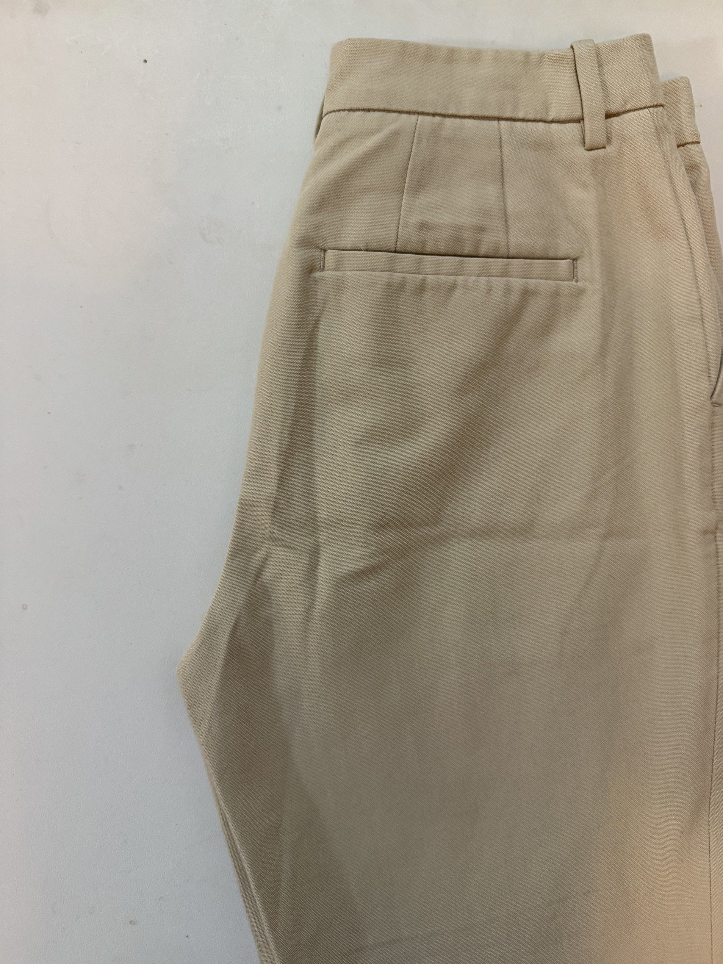 Uniqlo Smart Ankle Pants Small - Beige (Category: Other Bottoms) located in Quezon City. Submitted by graceavm. (Listing ID 1418282172, Image 1). Description: - Uniqlo, beige - barely used - has stains (from mixed laundry) probably removabale - Waist: 61cm - Hip: 88cm - Fabric: 53% Polyester, 42% Cotton, 5% Spandex.