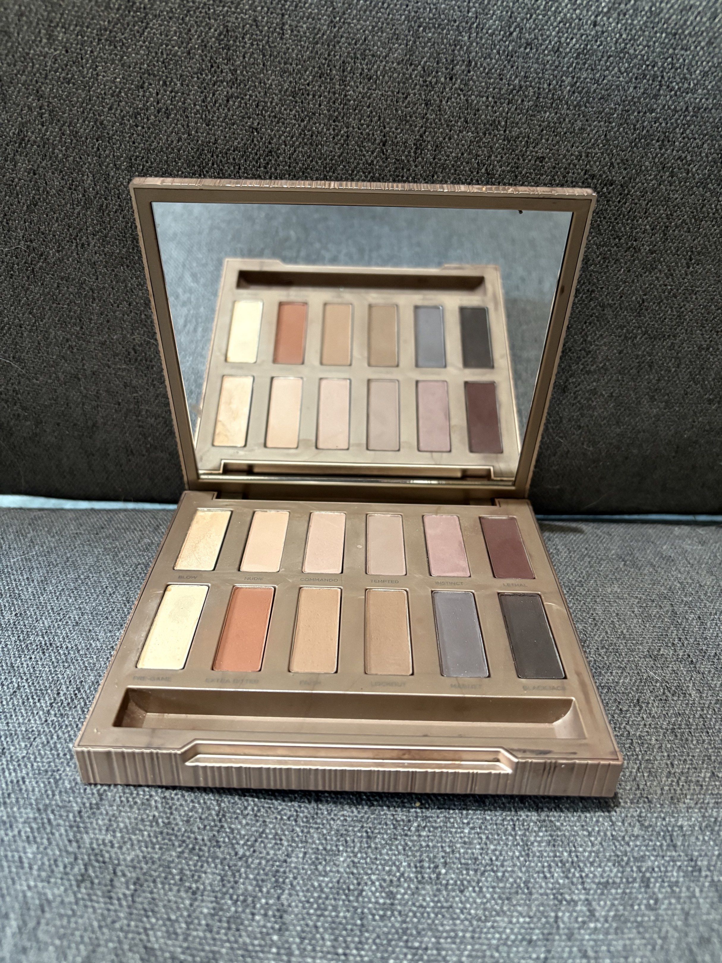 Urban Decay Naked Palette (Category: Makeup) located in Manila. Submitted by jari_m (Listing ID 1418246435, Image 2). Description: Urban Decay Naked Ultimate Basics eyeshadow palette 12 neutral eyeshadow shades No box No brush.