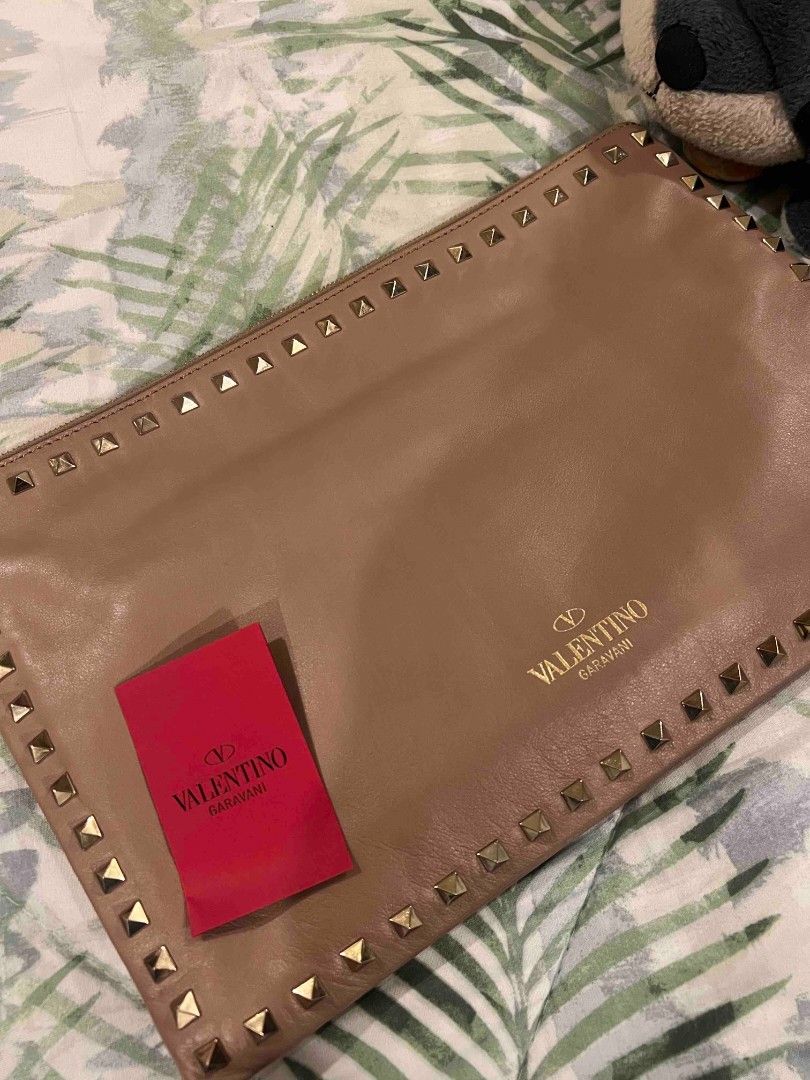Valentino Leather Studded Clutch Bag (Category: Luxury Bags & Wallets) located in Paranaque City. Submitted by bagbrained88 (Listing ID 1418374082, Image 3). Description: 100% original beautiful piece in actual.