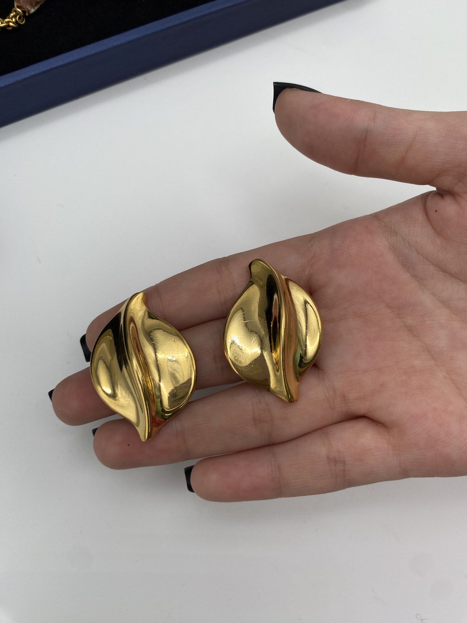 Vintage signed YSL statement clip on earrings (Category: Luxury Accessories) located in Quezon City. Submitted by vintagebymatilde (Listing ID 1418403761, Image 3). Description: ⚜️Vintage YSL clip on earrings. Signed on the clip backs and inner part. 1.5x1.2” in size. High quality. Authentic. Excellent condition. Rare pair sourced from Tokyo. DISCLAIMER All items posted in are previously owned. They are all categorized as vintage, antique or prel