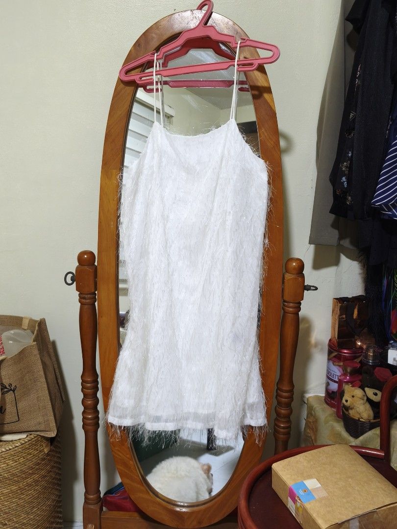 White Spaghetti Strap Dress (Category: Dresses) located in Cebu City. Submitted by roxyyap (Listing ID 1418397992, Image 2). Description: - White spaghetti strap dress - Textured, fringed design - Simple and elegant cut - Lightweight and comfortable - Suitable for casual and special occasions.