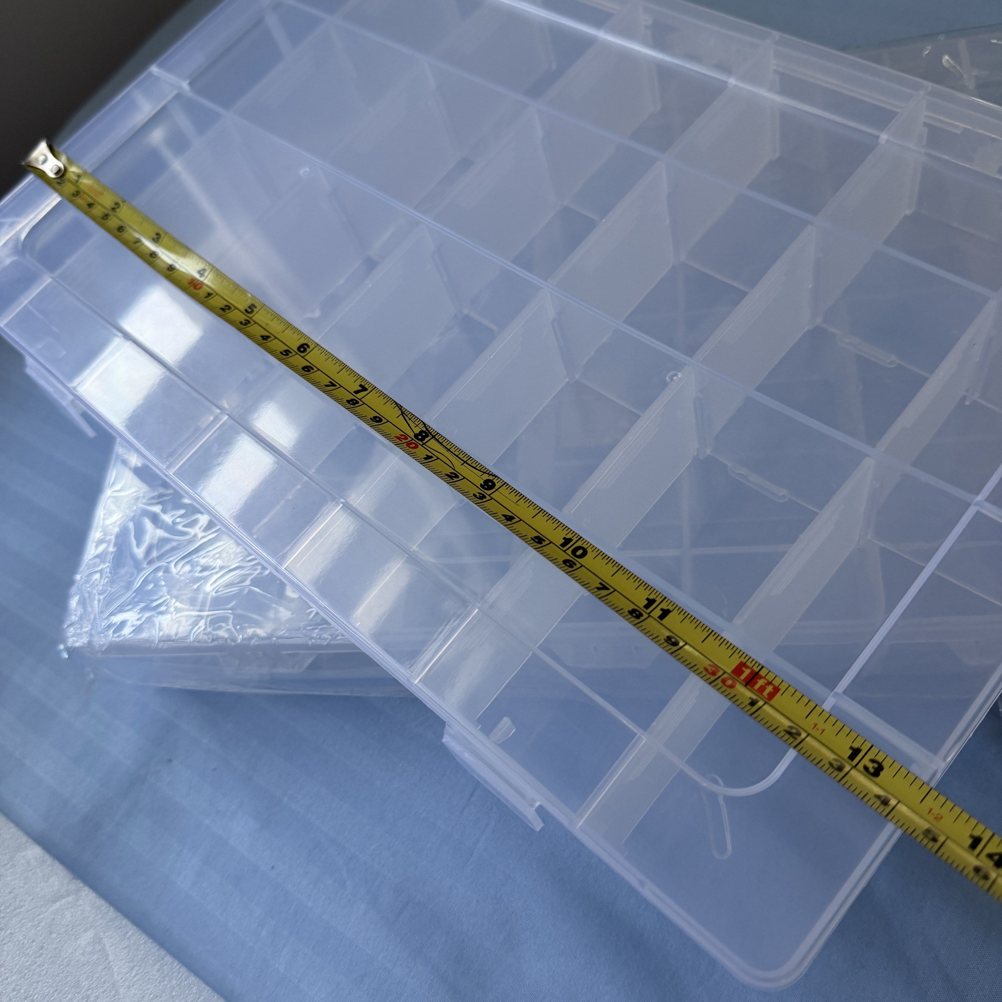 2 pcs Clear Plastic Compartment Storage Box (Category: Storage Boxes & Baskets) located in Caloocan City. Submitted by shoppingmi28011 (Listing ID 1418417461, Image 2). Description: - Clear compartment storage box - Multiple compartments for easy sorting - See contents at a glance - Secure closure - Ideal for beads, craft supplies, hardware, etc. - Approximately 14 inches long.