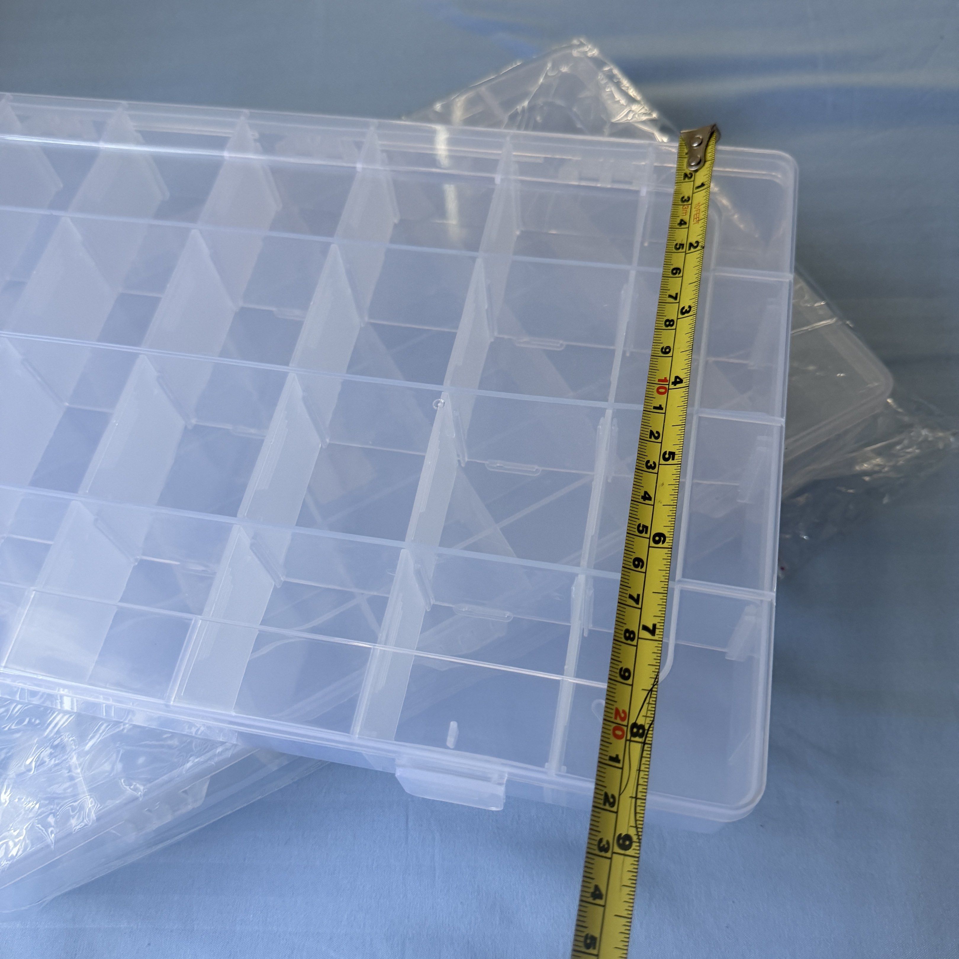 2 pcs Clear Plastic Compartment Storage Box (Category: Storage Boxes & Baskets) located in Caloocan City. Submitted by shoppingmi28011 (Listing ID 1418417461, Image 3). Description: - Clear compartment storage box - Multiple compartments for easy sorting - See contents at a glance - Secure closure - Ideal for beads, craft supplies, hardware, etc. - Approximately 14 inches long.