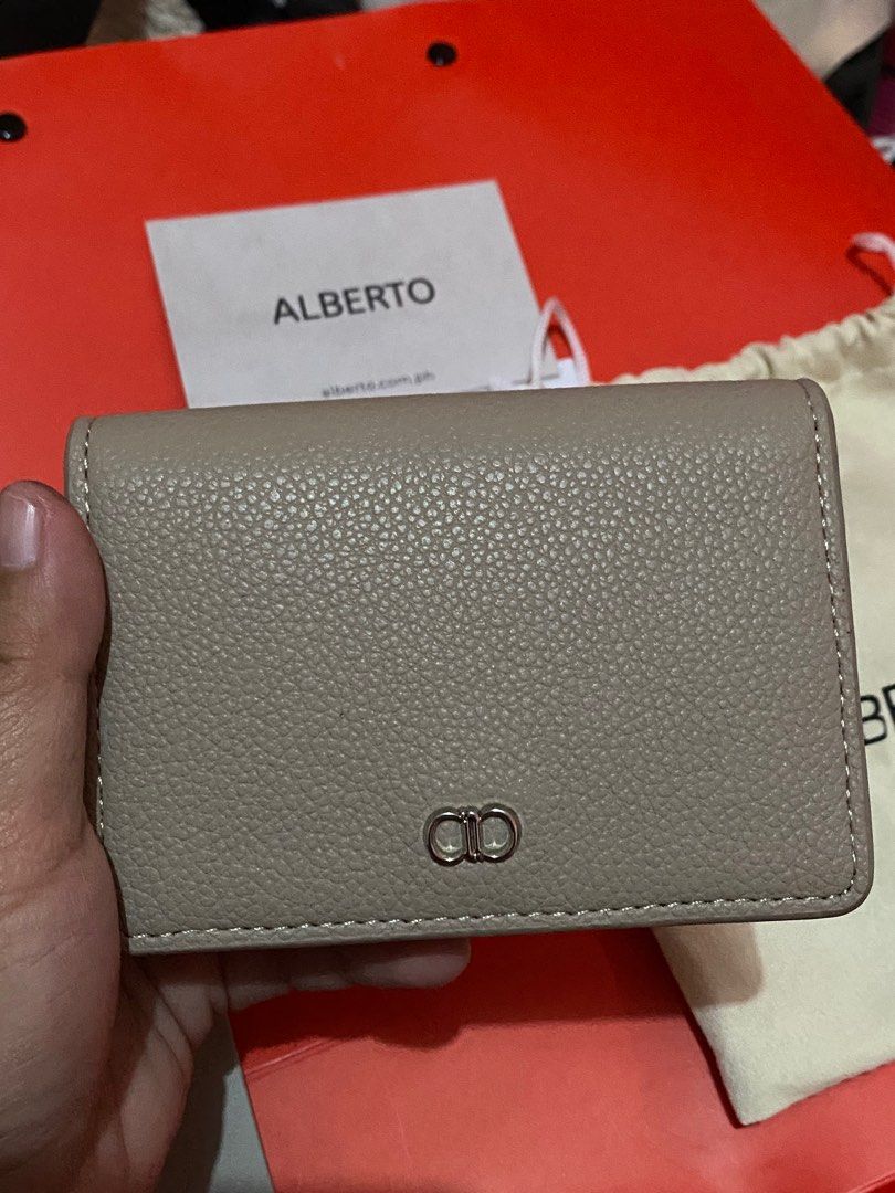 Alberto (Category: Luxury Bags & Wallets) located in Pasig City. Submitted by mariiiee.024 (Listing ID 1418579051, Image 3). Description: Alberto Wallet Color Taupe Bought for 699 For sale for 570 Slightly negotiable.