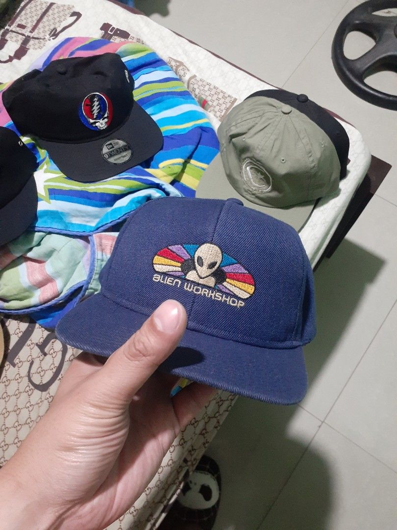 Alien Workshop vintage hat (Category: Caps & Hats) located in Bangued. Submitted by jasfliperks (Listing ID 1418530430, Image 1). Description: - Embroidered alien design with rainbow wing - Navy blue brim NEGOTIABLE - Green underside.