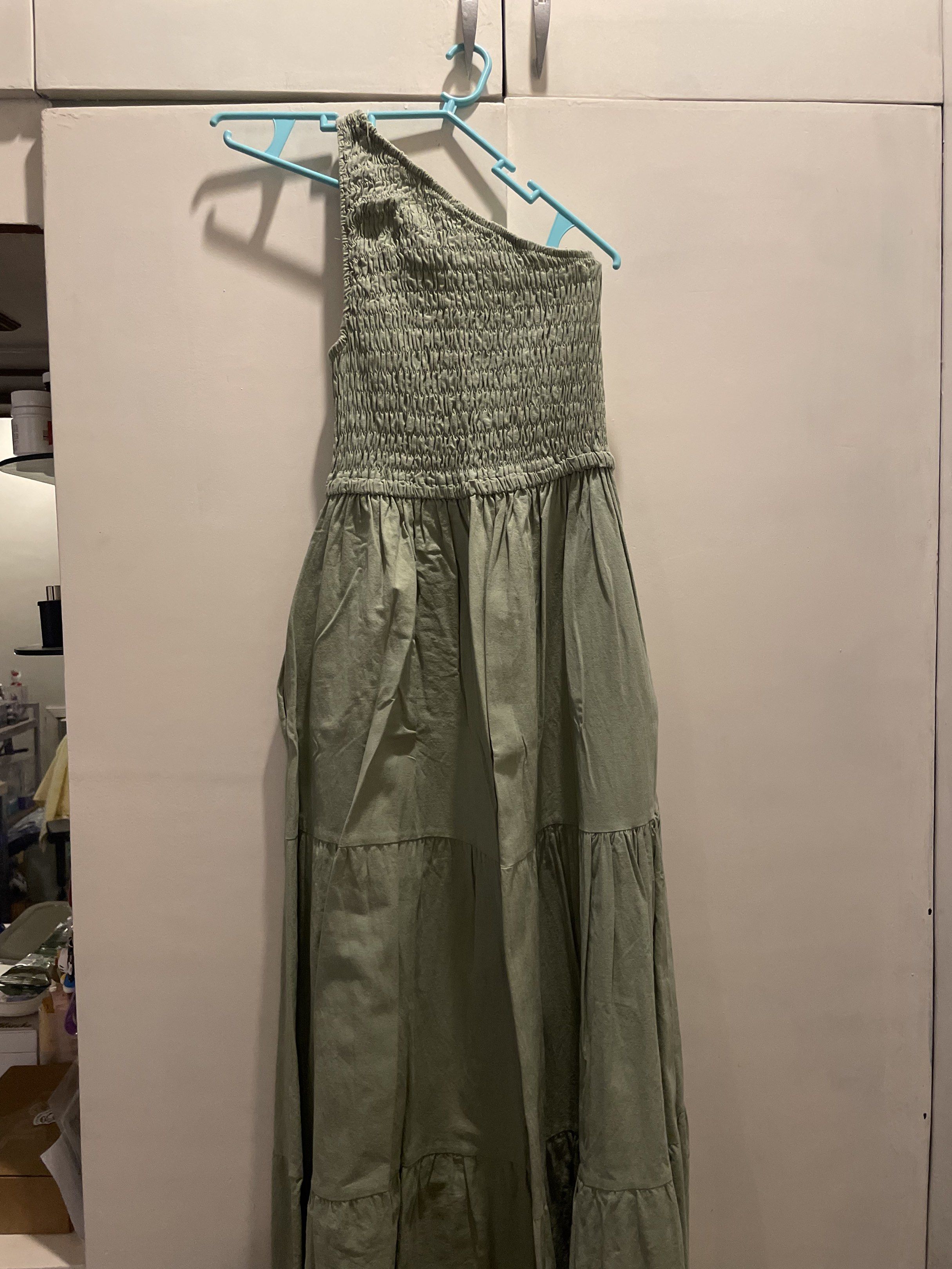 Asymmetrical Sage Green Dress (Category: Dresses) located in Las Pinas. Submitted by bmtl_ (Listing ID 1418563473, Image 1). Description: Asymmetrical dress Sage green Size M Used once on a beach trip RFS: Decluttering.