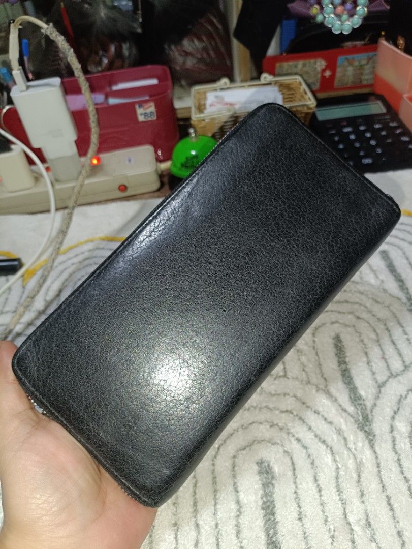 Balmain Leather Full Zip Long Wallet (Category: Luxury Bags & Wallets) located in San Pedro. Submitted by elevens_online_thrift_shop (Listing ID 1418542297, Image 2). Description: missing pullet leather balmain heat stamp genuine Leather ykk zip can fit phone used with care.