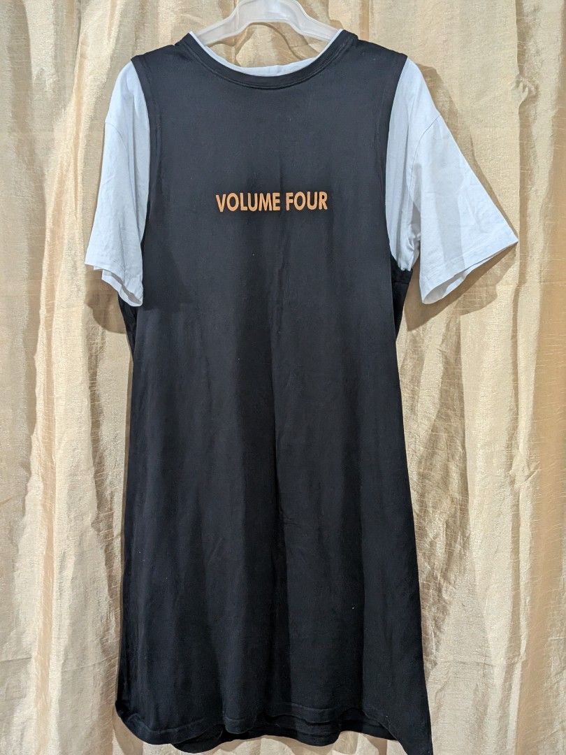 Black and white dress (Category: Tshirts & Polo Shirts ) located in Quezon City. Submitted by stuff.decluttered (Listing ID 1418544184, Image 1). Description: - Black front panel, white sleeves - "Volume Four" print on front - Relaxed fit - Ideal for casual wear.