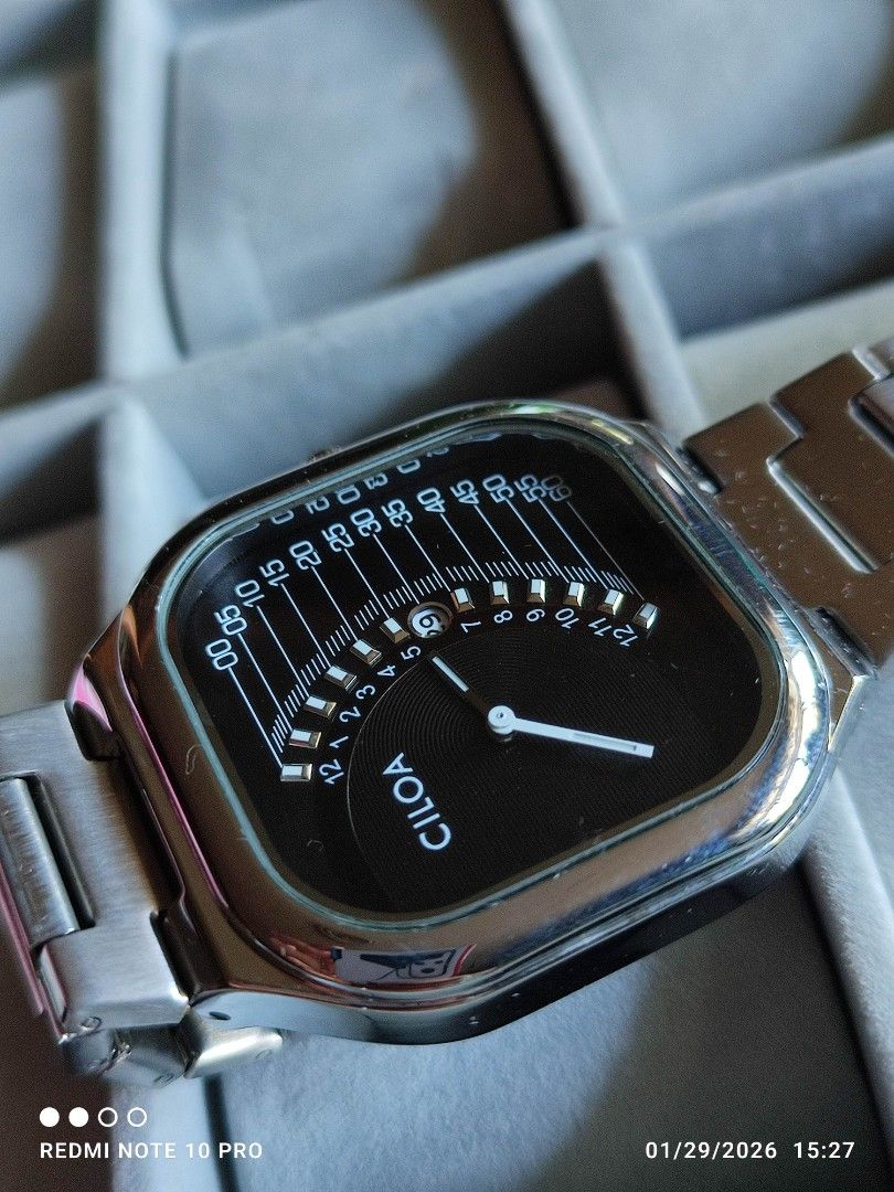 Ciloa Stainless Steel Watch (Category: Men's Watches) located in Mangaldan. Submitted by michelle_2004 (Listing ID 1418475428, Image 3). Description: - Ciloa watch with a unique square face - Features a sleek black dial - Durable stainless steel band - Water resistant up to 5 ATM - Distinctive time display.