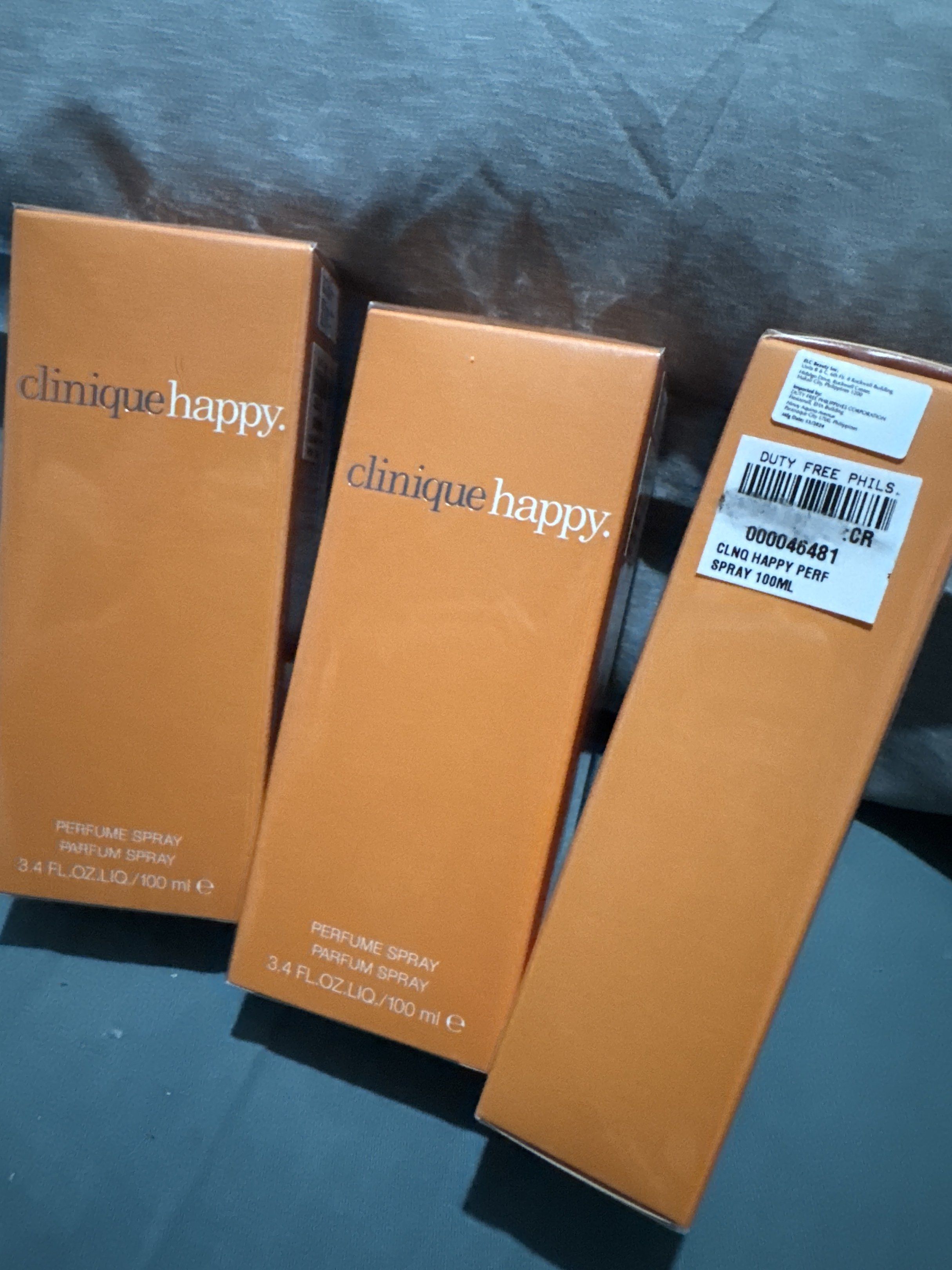 Clinique Happy Perfume Spray 100ml (Category: Fragrance & Deodorants) located in Manila. Submitted by love2click (Listing ID 1418550955, Image 1). Description: Clinique Happy for Women, launched in 1997-1998, is a popular citrus-floral fragrance known for its uplifting, fresh, and vibrant scent profile. It blends top notes of orange, blood grapefruit, and bergamot with a heart of lily-of-the-valley and rose, creating a, light, energetic fragrance