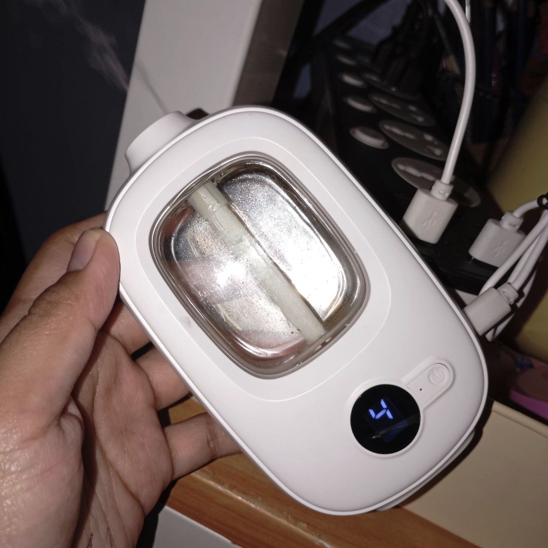 Diffuser Kit (Category: Air Purifiers & Dehumidifiers) located in Quezon City. Submitted by ana-chan (Listing ID 1418592676, Image 3). Description: Air Well diffuser with water-soluble oil and replacement wicks. Includes USB charging cable. Digital display and button operation. Good working condition. Comes with two oil bottles..