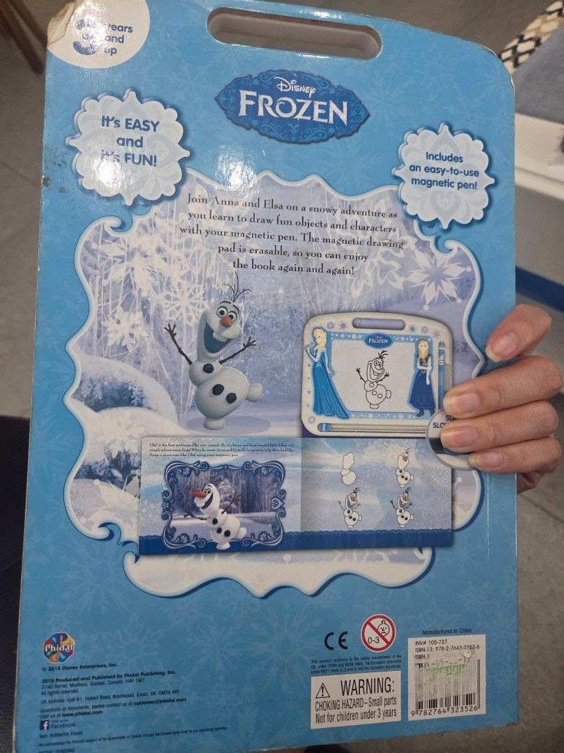 Disney Frozen Magnetic Drawing Board (Category: Art & Prints) located in San Juan City. Submitted by simplyj18 (Listing ID 1418412633, Image 2). Description: - Disney Frozen magnetic drawing board - Features Elsa and Anna designs - Includes magnetic pen - Easy to draw and erase - Reusable for endless fun - Back of packaging shows drawing examples.