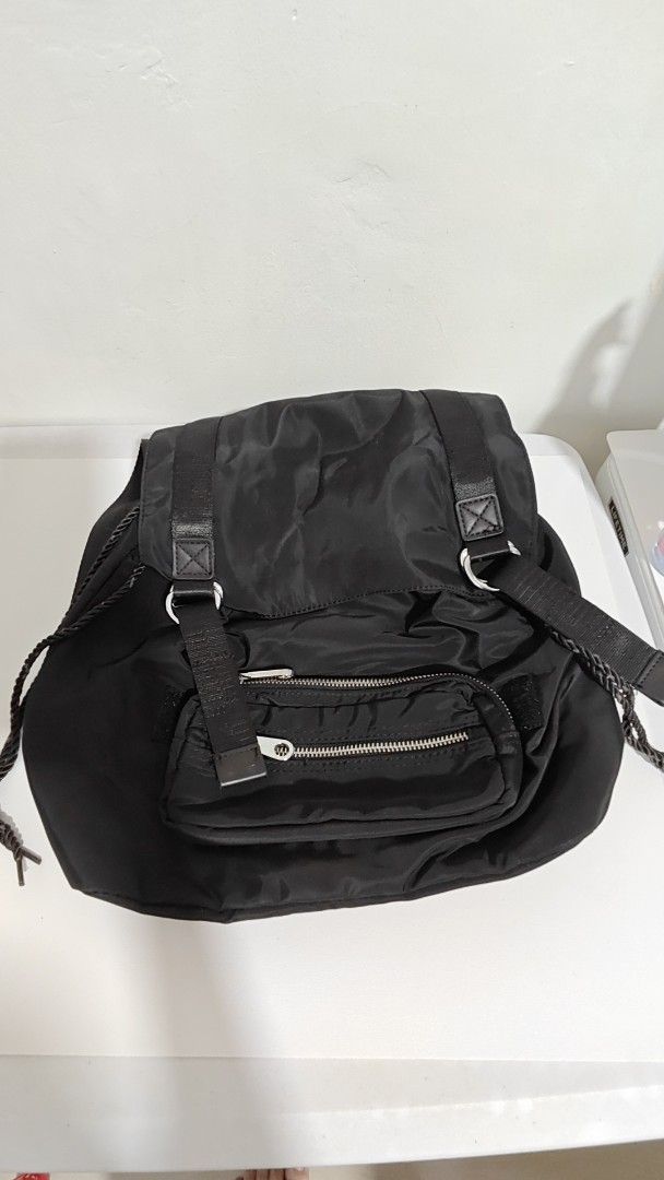Drawstring black backpack (Category: Backpacks) located in Antipolo. Submitted by behowling (Listing ID 1418415526, Image 1). Description: - Black backpack - Drawstring and flap closure - Adjustable shoulder straps - Nylon-like material.