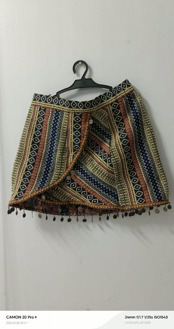 Embroidered Wrap Skirt (Category: Skirts) located in Quezon City. Submitted by sheila0721 (Listing ID 1418462277, Image 1). Description: - Colorful embroidered wrap mini skirt - Unique vertical stripes and geometric pattern - Adorned with small embellishments on the hemline - Casual and bohemian style S-M 2pcs Available 300+++ orig price never been used.