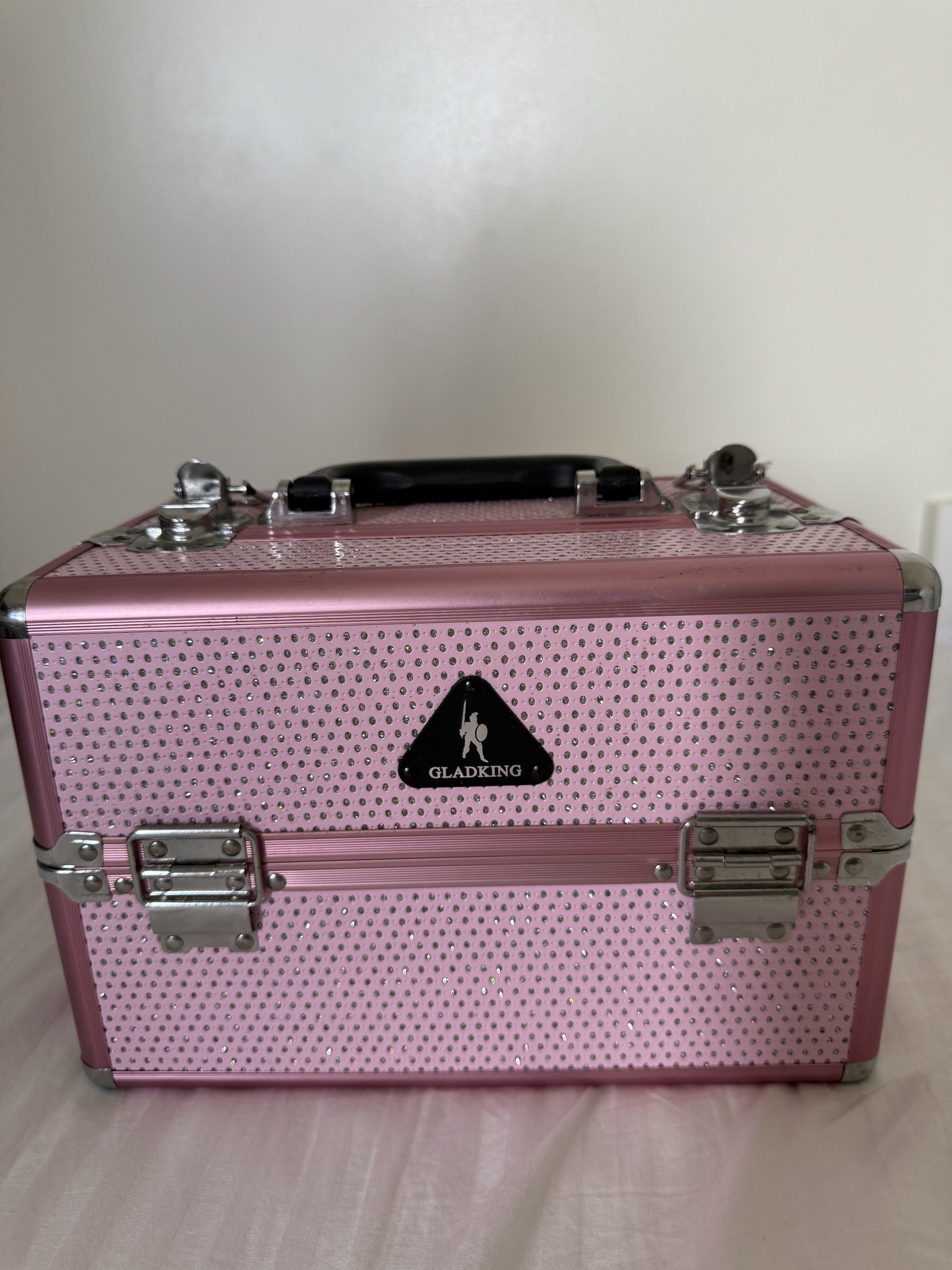 Gladking Trainer 3 Layered Makeup Kit Glittery (Category: Makeup) located in Paranaque City. Submitted by angela_yvtte (Listing ID 1418473265, Image 1). Description: - Gladking Trainer Makeup Kit - Glittery pink design - Features 3 layers for storage - Stylish and functional makeup organizer - Has minimal make up stains (can be wiped) - Original price is 3,300 PHP.