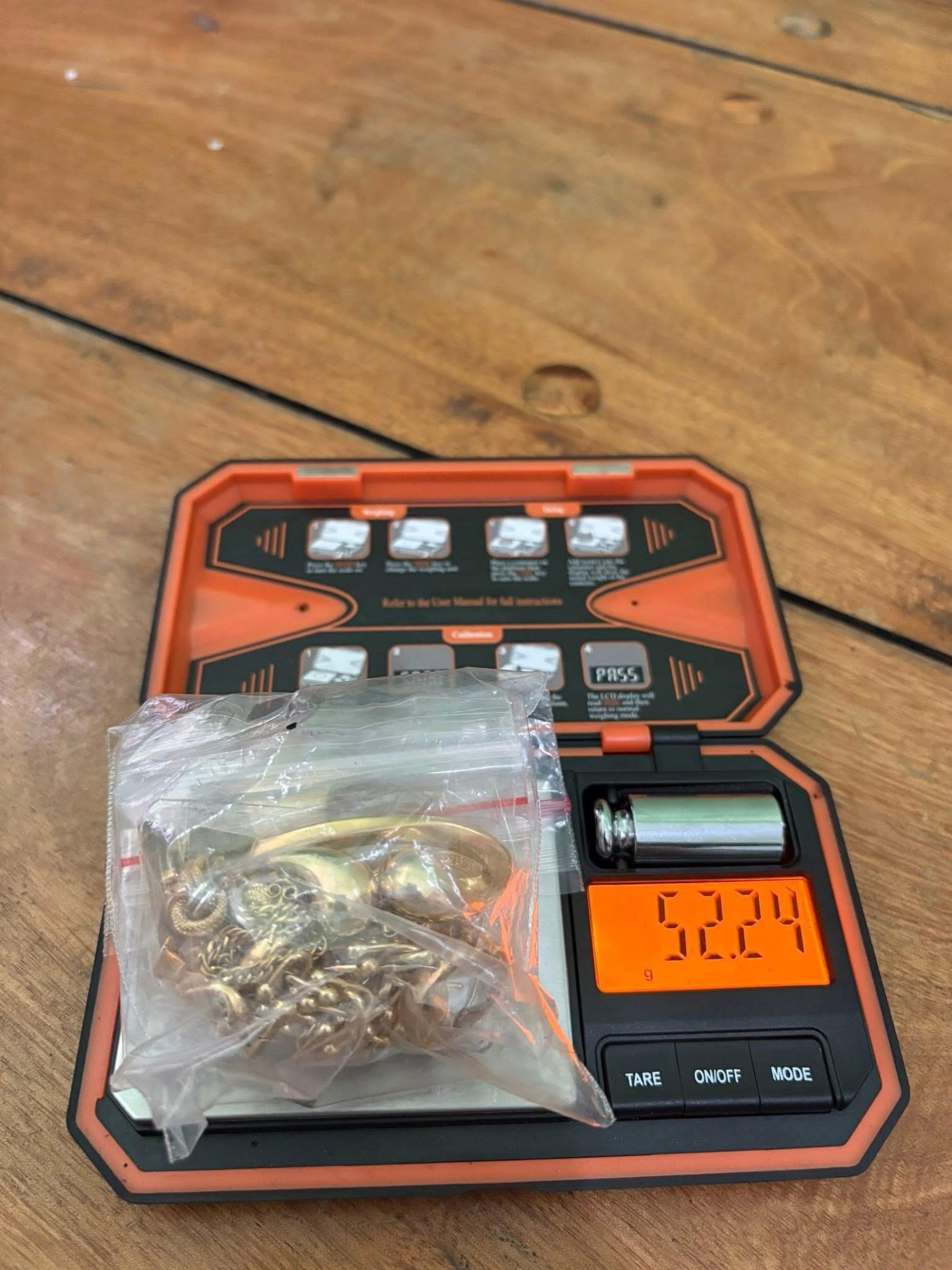 Gold Jewelry 52.24g (Category: Accessory Holder, Box & Organizers) located in Antipolo. Submitted by murapod2 (Listing ID 1418589310, Image 1). Description: - Genuine gold jewelry - Total weight: 52.24 grams - Includes a variety of chains and pendants - Elegant gold color - Securely packaged in a plastic bag.