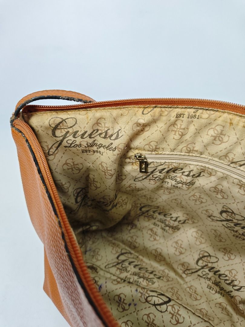 Guess Bobbi Tote Handbag Brown (Category: Tote Bags) located in Quezon City. Submitted by madtoken2 (Listing ID 1418558086, Image 3). Description: Price: P1000 (Negotiable) Condition: pre-owned, used with flaws (ask for detailed photos) Description: This GUESS tote handbag in tan is the perfect accessory for any occasion. With a solid pattern and pebbled finish, it is a stylish addition to your wardrobe. The bag has a zip closure and shoulder str
